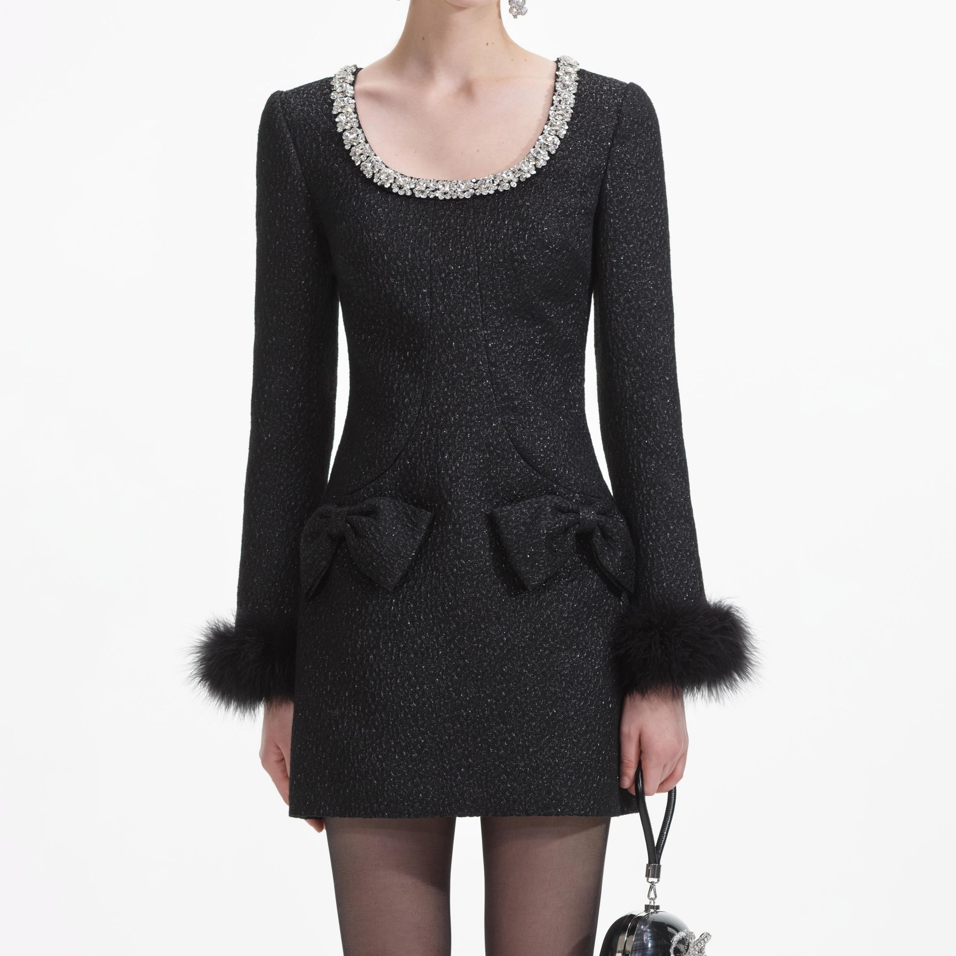 A close up of a woman wearing the Black Textured Metallic Mini Dress