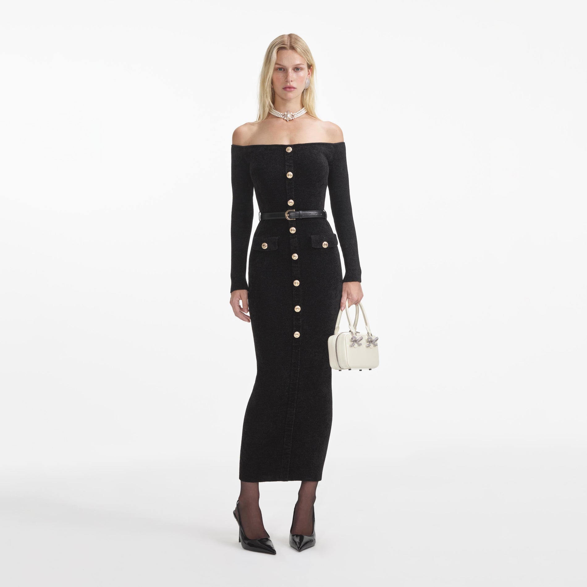 Front view of a woman wearing the Black Chenille Knit Midi Dress