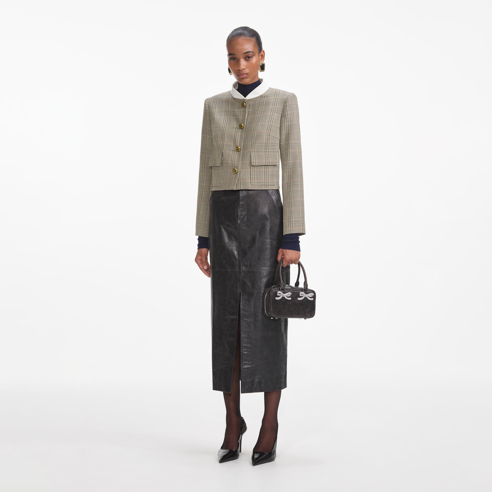 Side view of a woman wearing the Check Wool Jacket