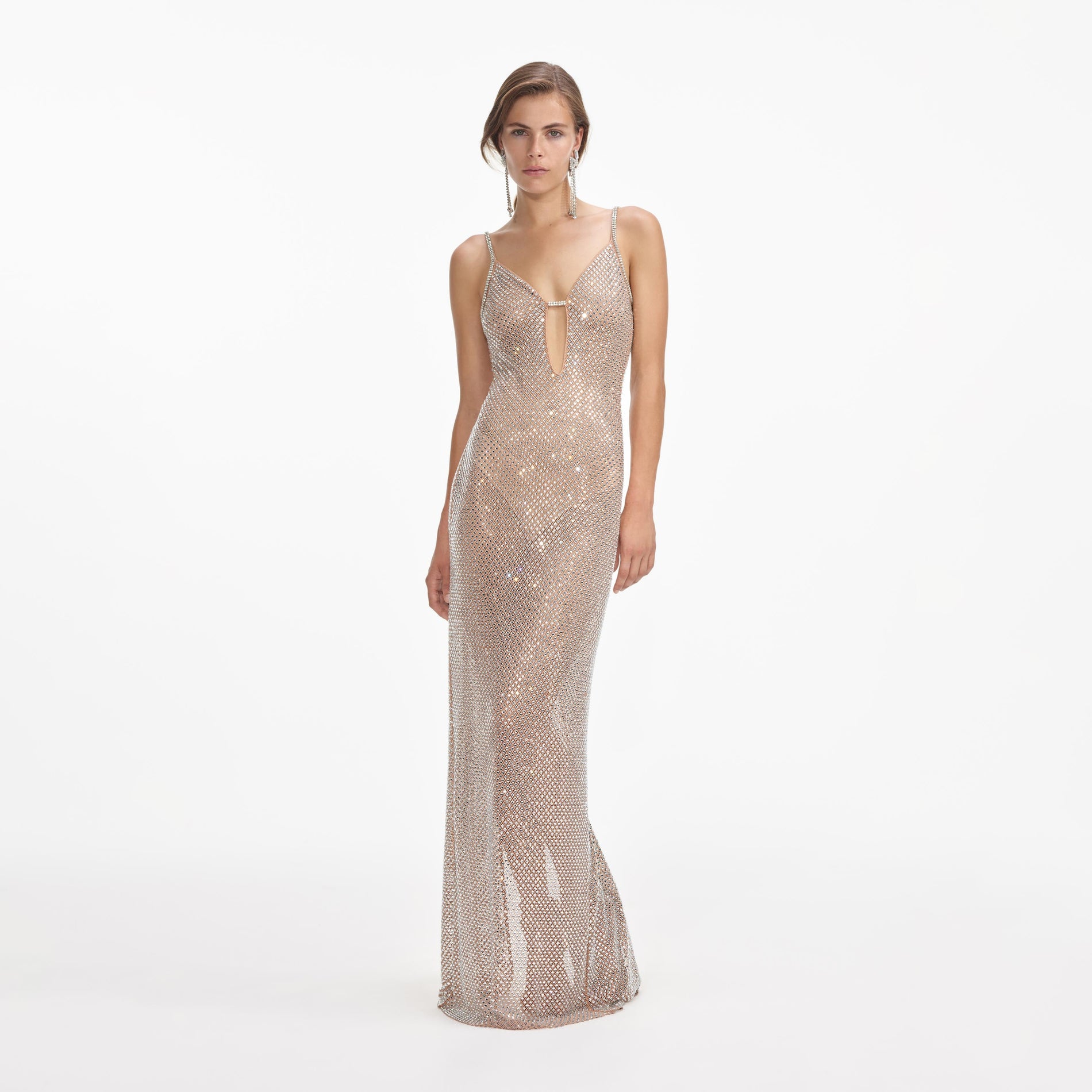 Front view of a woman wearing the Silver Rhinestone Fishnet Maxi Dress