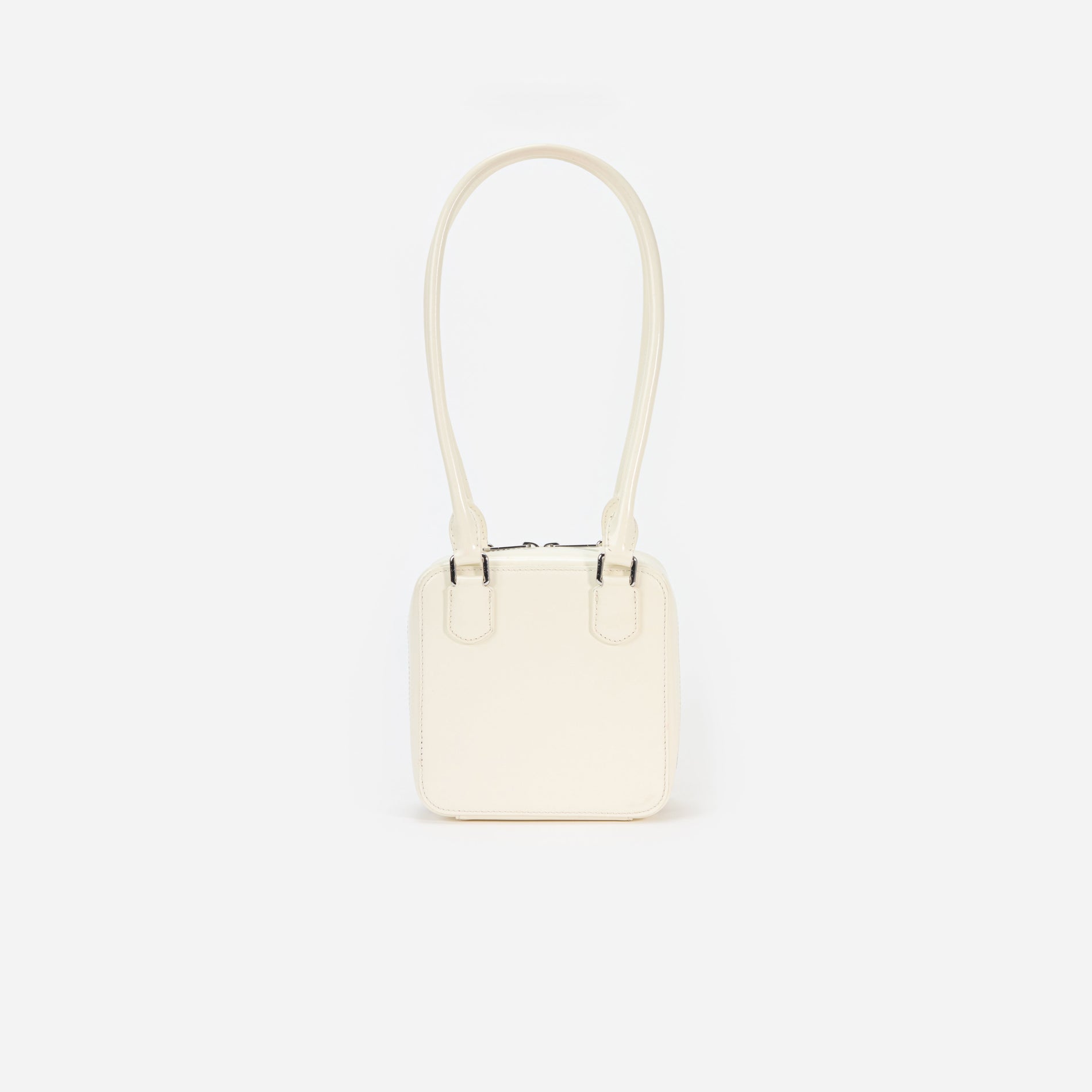 Back view of a woman wearing the Cream Leather Square Shoulder Bag
