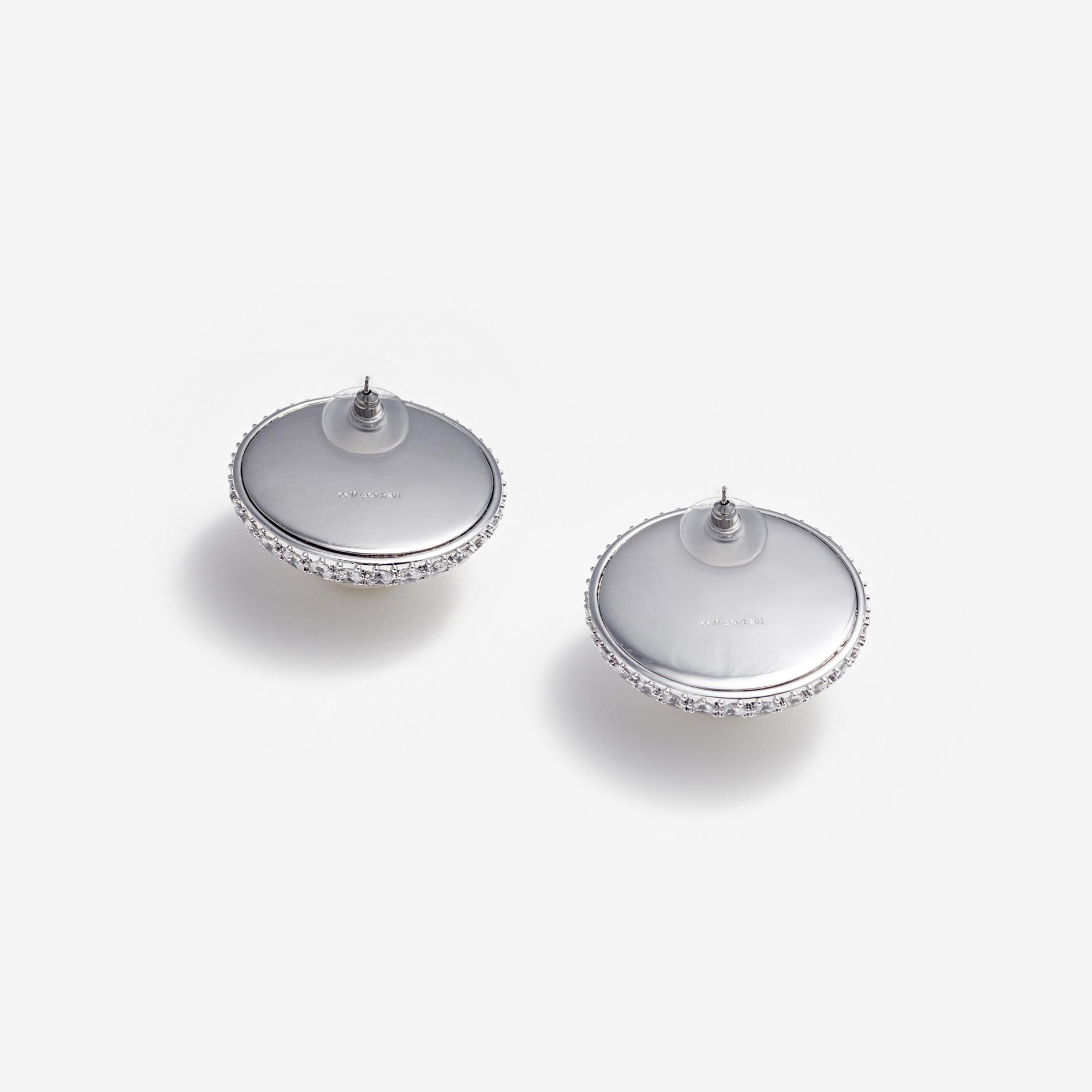 Side view of a woman wearing the Crystal Pearl Earrings