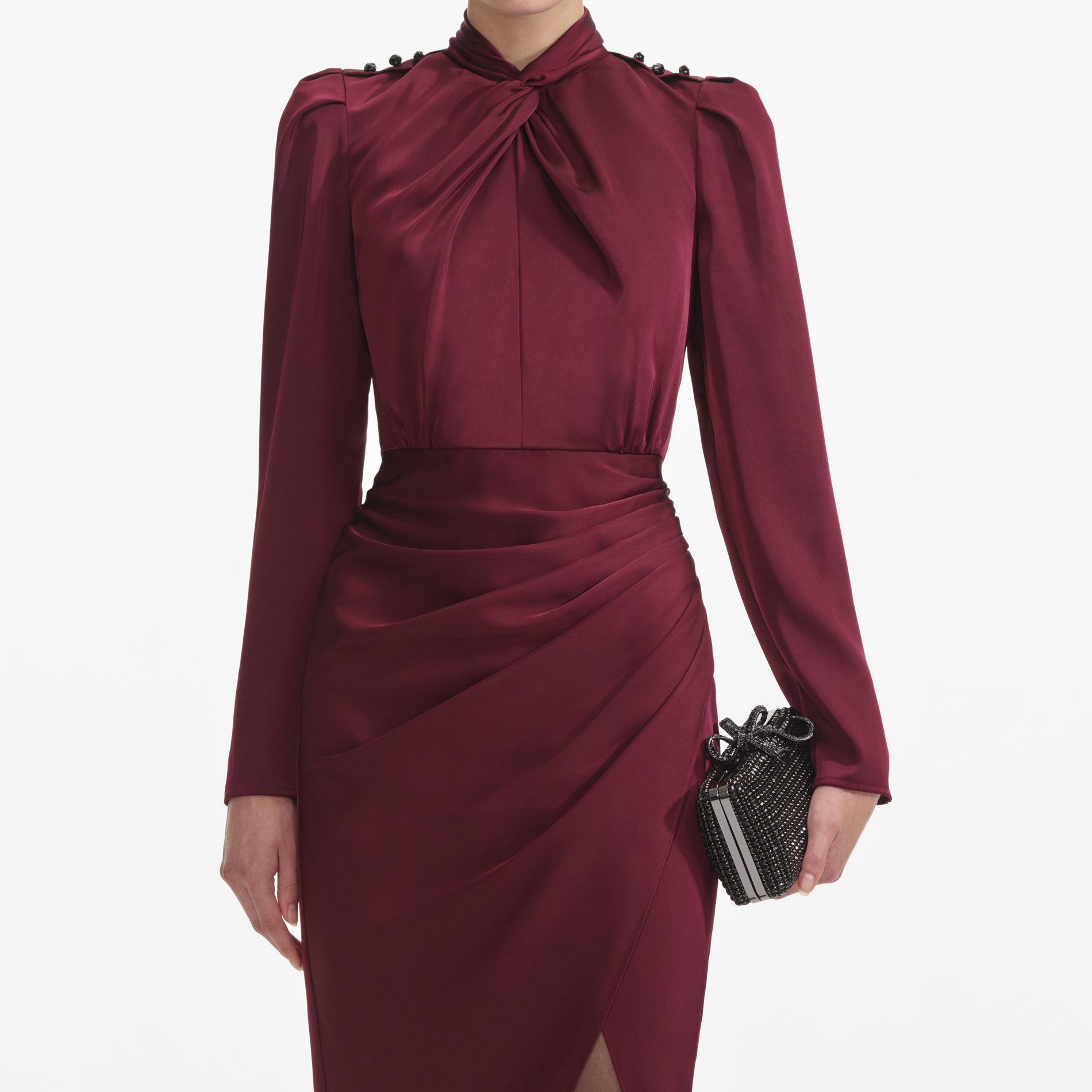 A close up of a woman wearing the Burgundy Satin Midi Dress