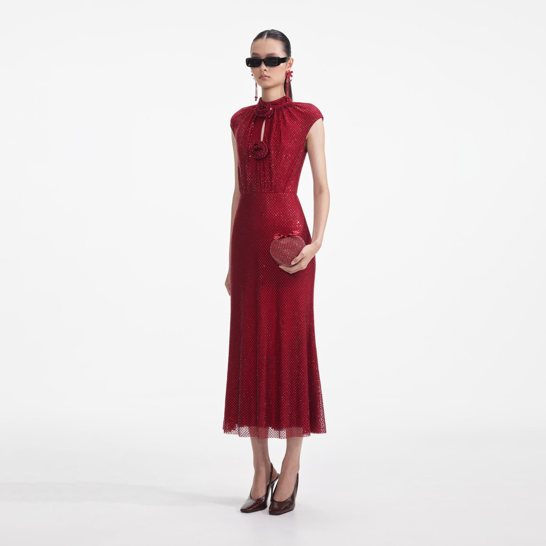 Side view of a woman wearing the Red Rhinestone Fishnet Midi Dress