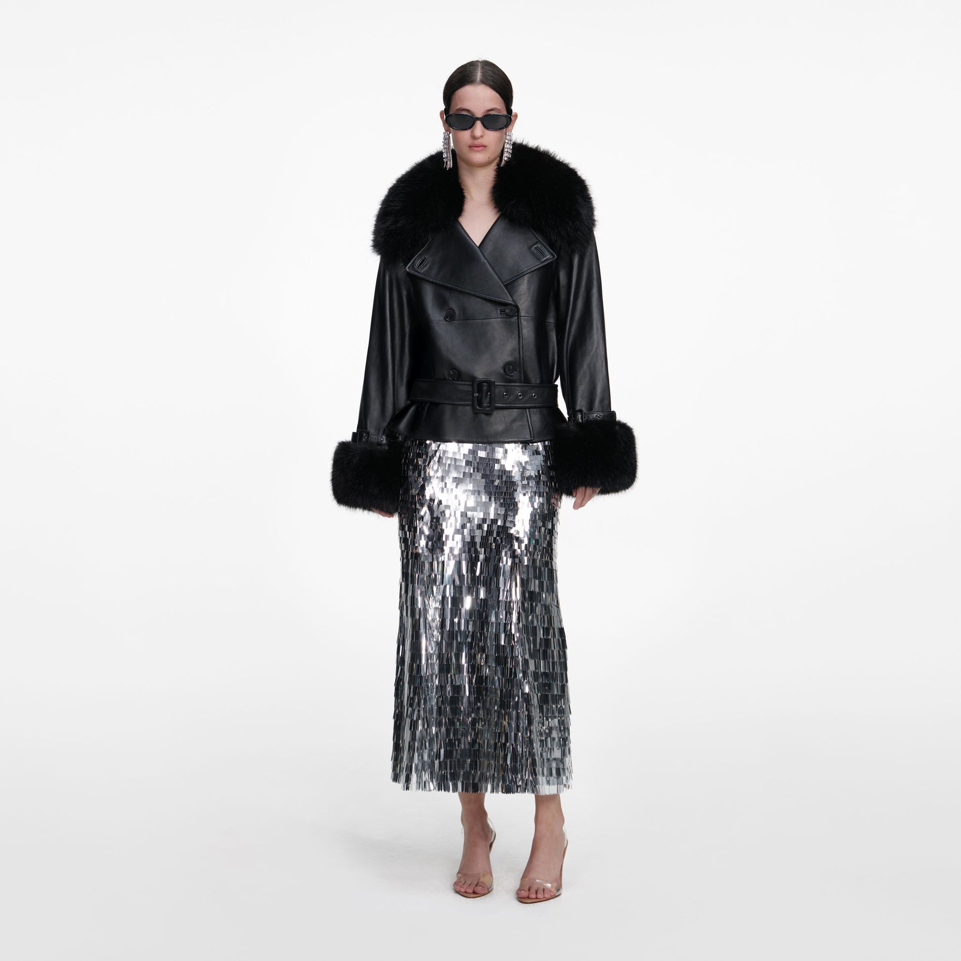 Front view of a woman wearing the Black Belted Leather Jacket