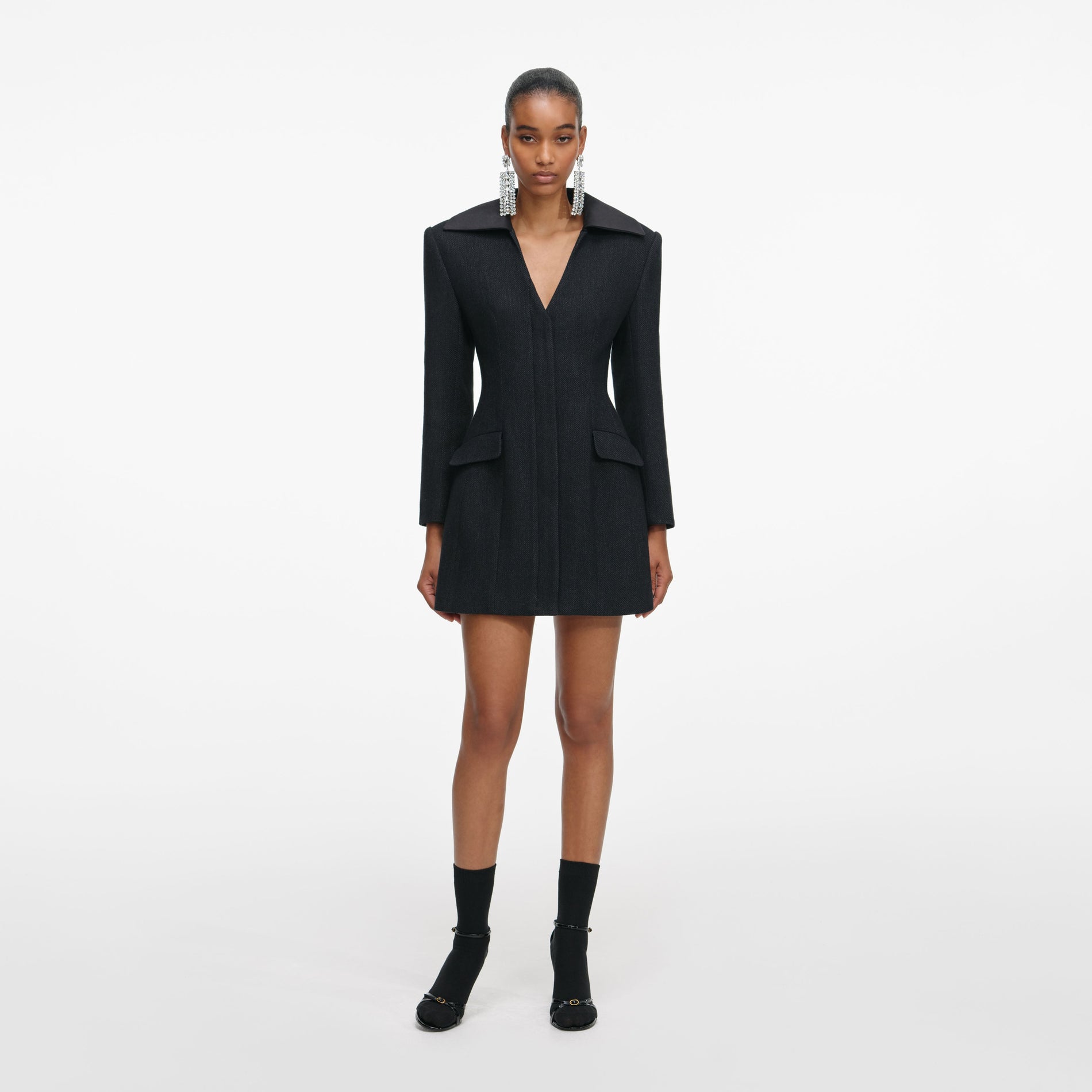 Front view of a woman wearing the Black Blazer Mini Dress