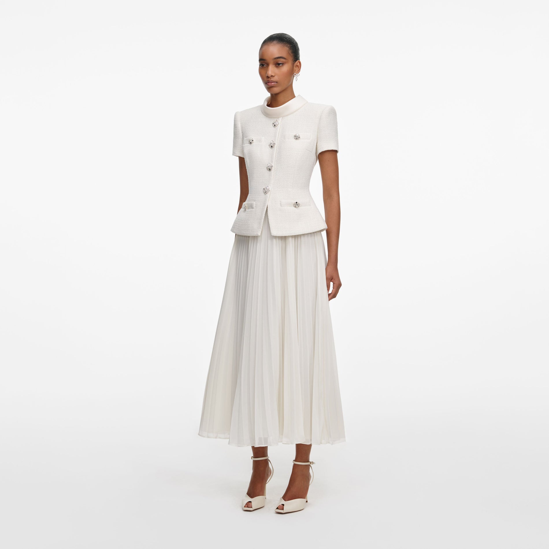 Side view of a woman wearing the Cream Boucle Collared Midi Dress