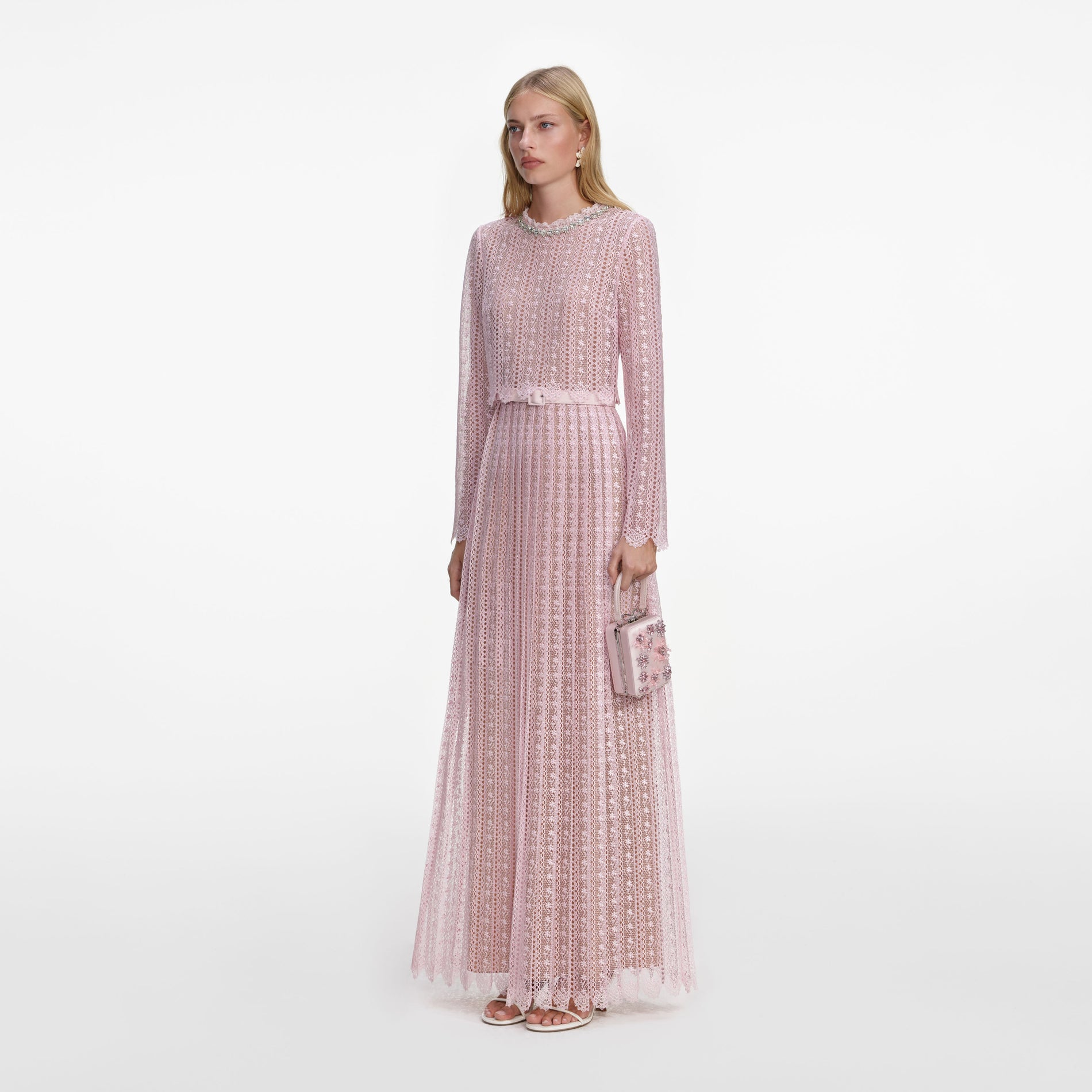 A close up of a woman wearing the Pink Organza Lace Maxi Dress