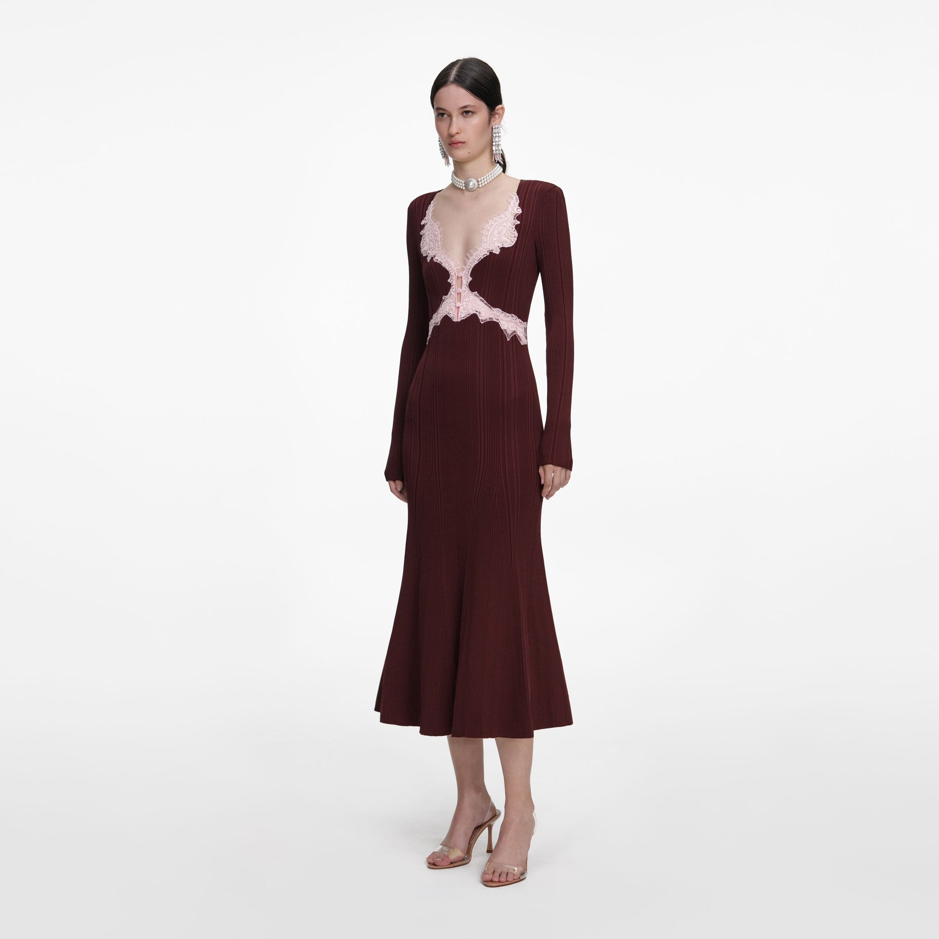 Side view of a woman wearing the Brown Contrast Lace Knit Midi Dress