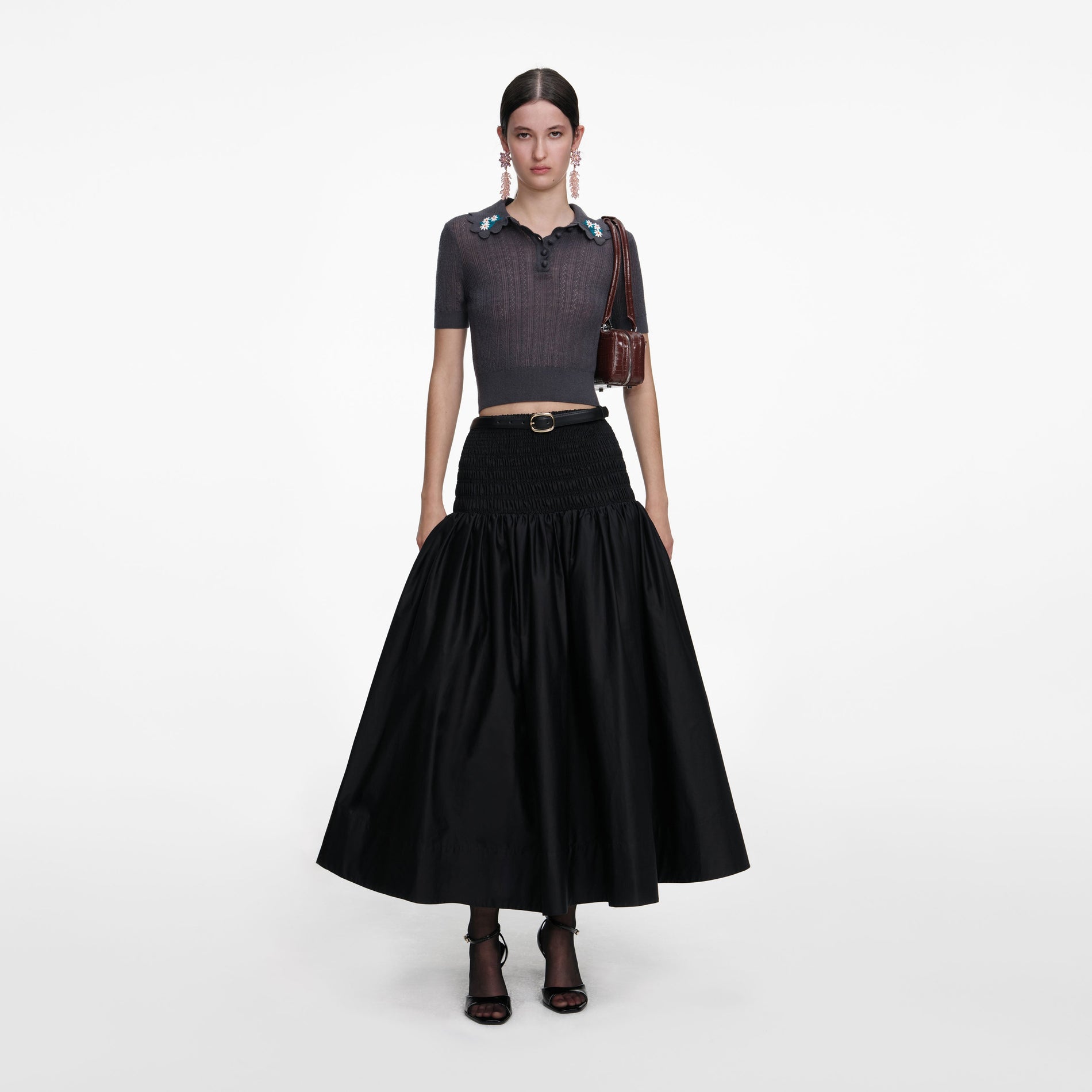 Front view of a woman wearing the Grey Embroidered Pointelle Knit Top