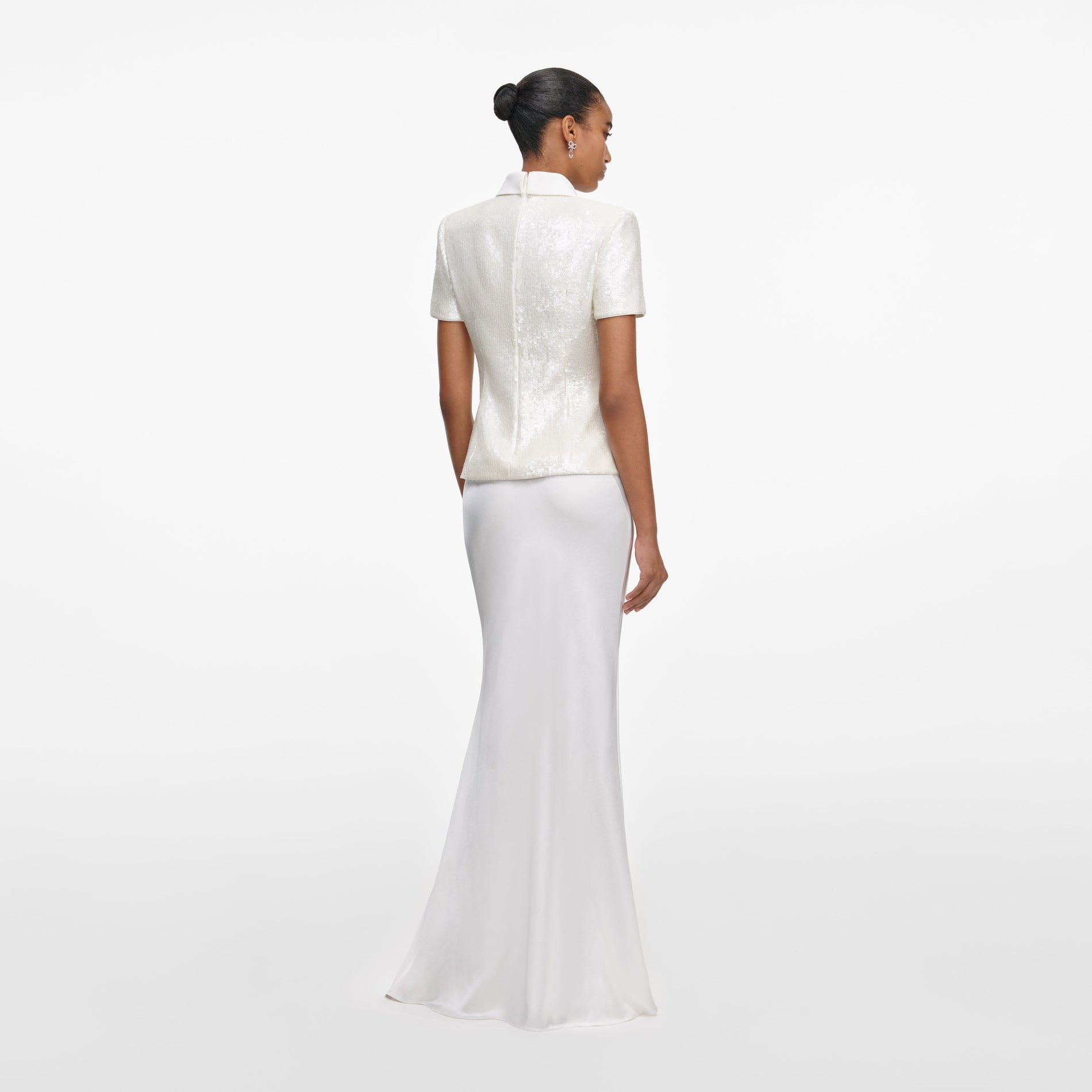 Back view of a woman wearing the White Sequin Tailored Maxi Dress