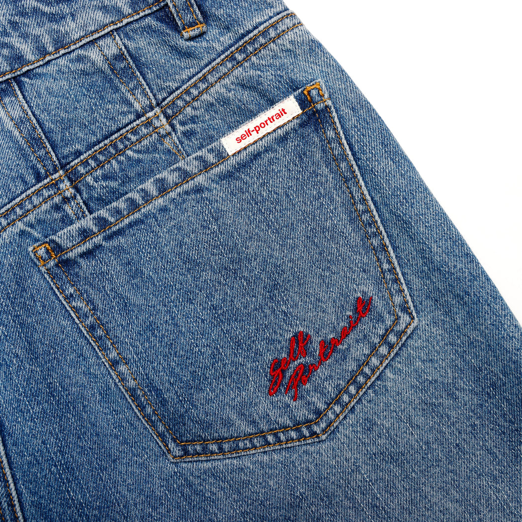 A close up of the fabric for the Blue Barrel Leg Jeans