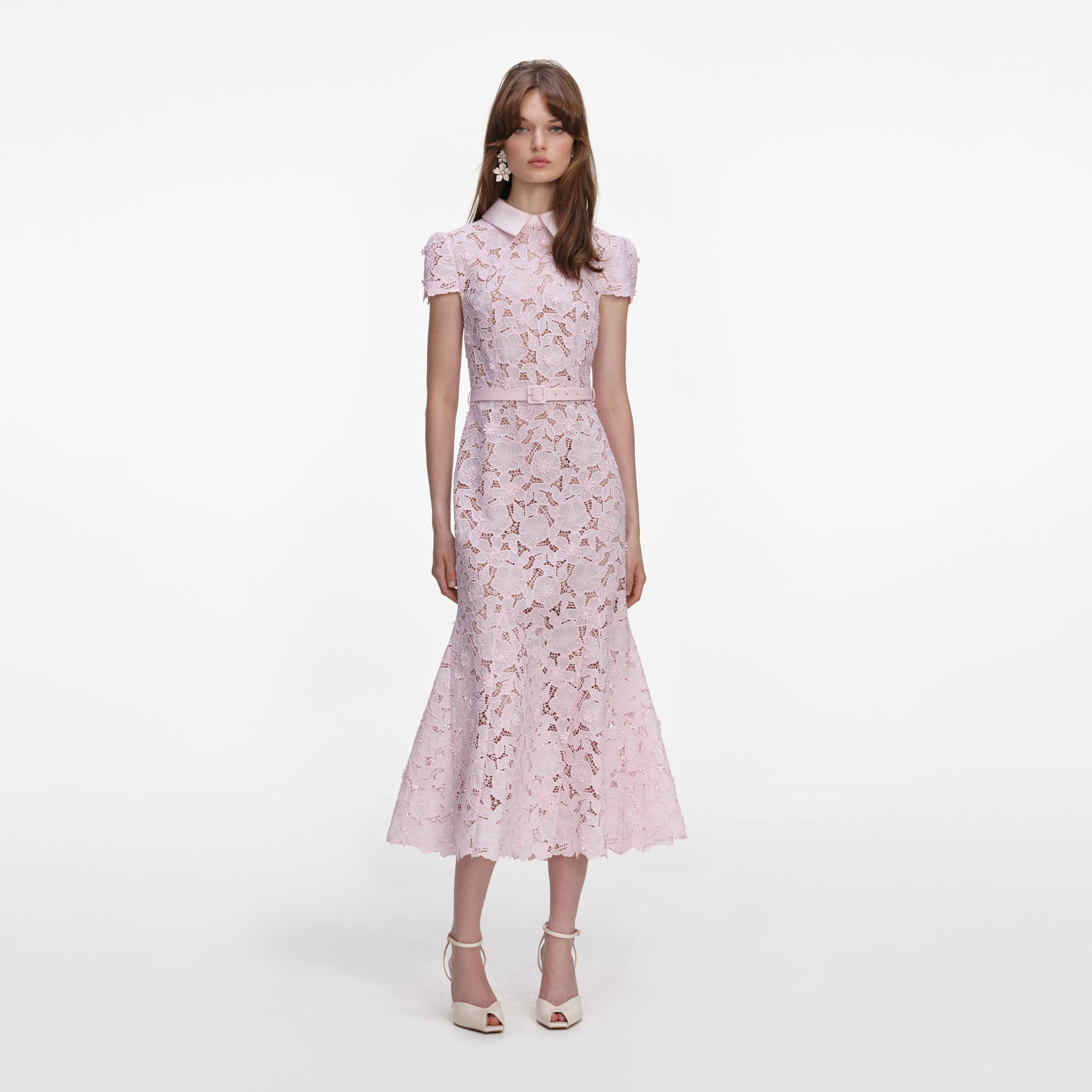 Front view of a woman wearing the Pink Guipure Lace Midi Dress