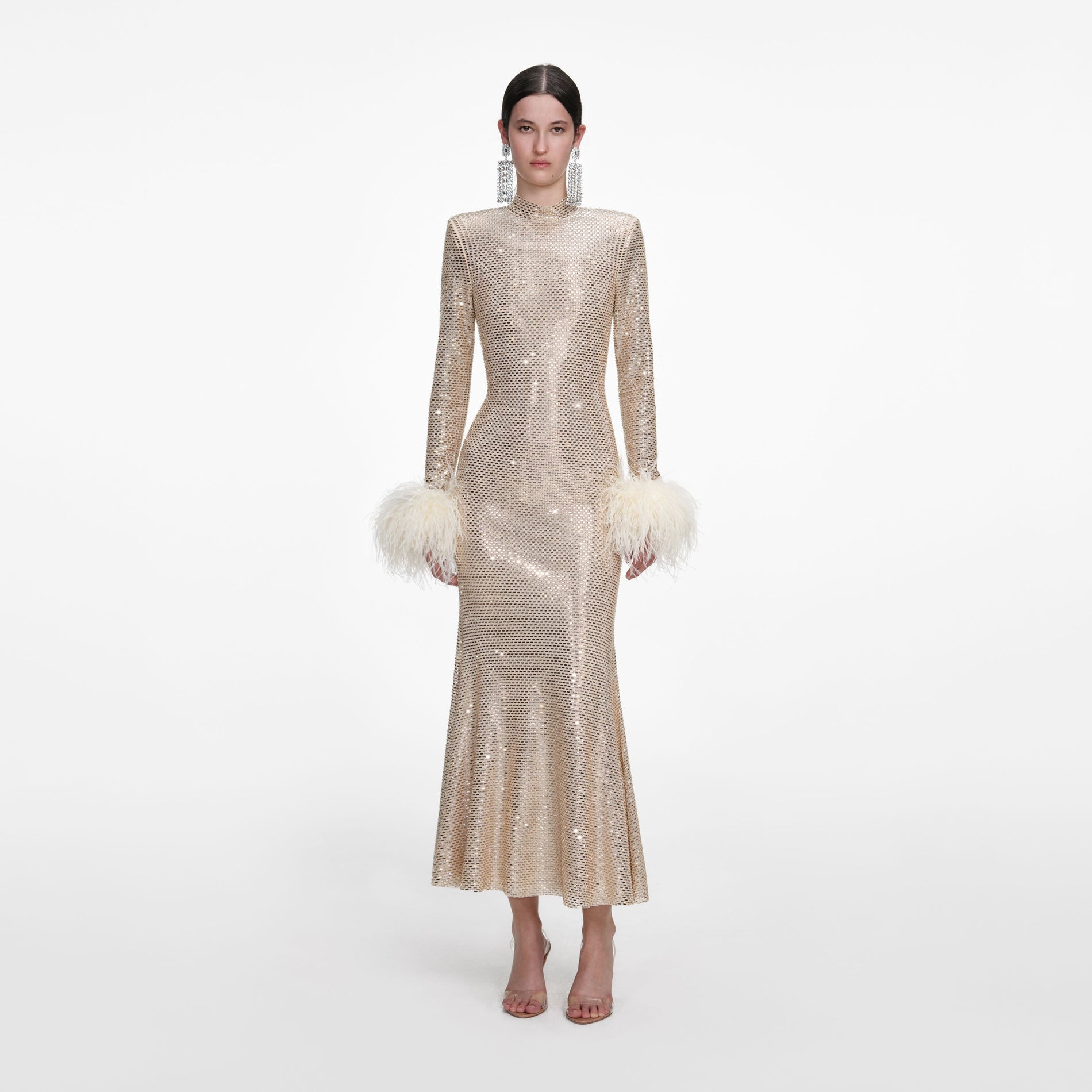Front view of a woman wearing the Champagne Rhinestone Feather Midi Dress