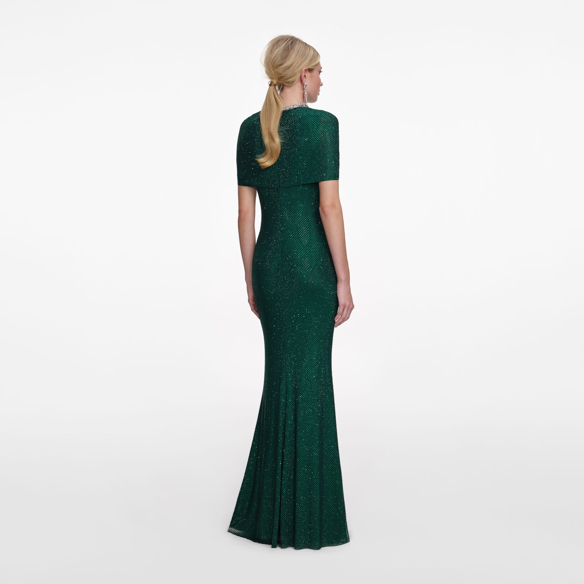 Back view of a woman wearing the Green Rhinestone Maxi Dress