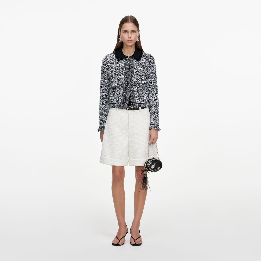 Front view of a woman wearing the Cream Sequin Boucle Tailored Shorts
