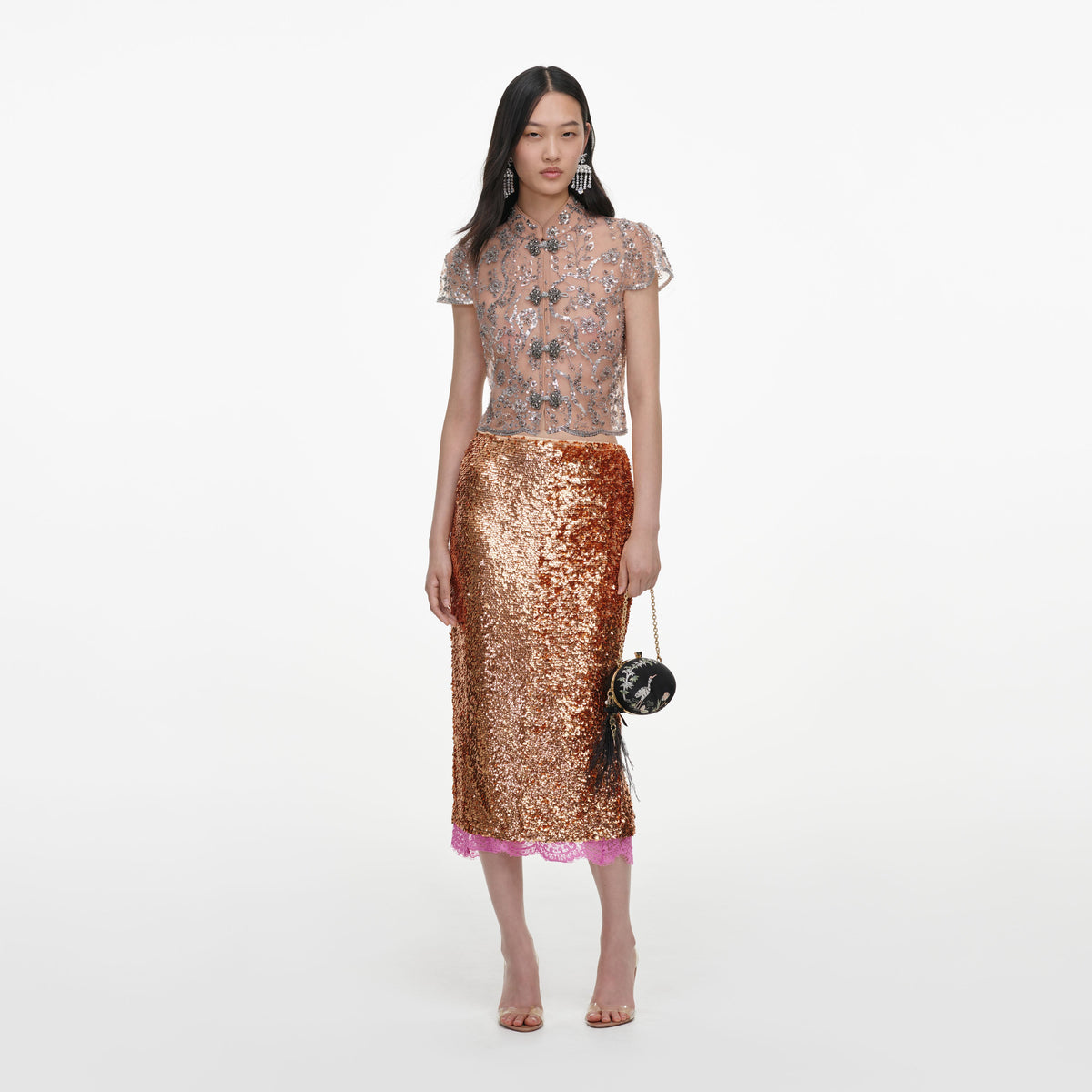 Front view of a woman wearing the Silver Sequin Embellished Top