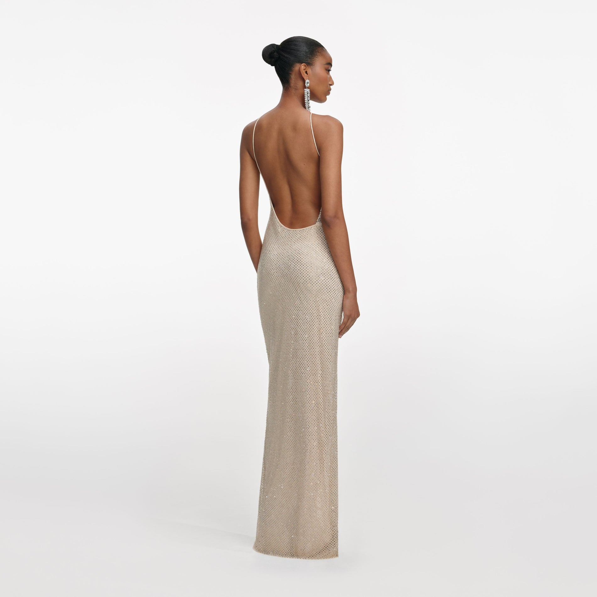 Back view of a woman wearing the Champagne Rhinestone Lace Trim Maxi Dress