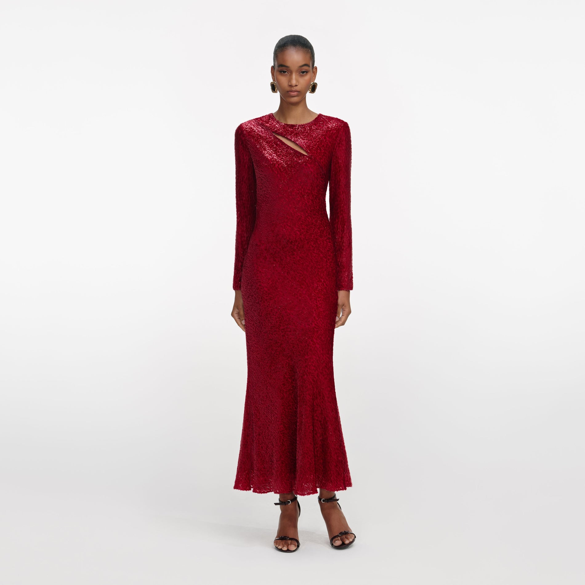 Front view of a woman wearing the Red Fil Coupe Midi Dress