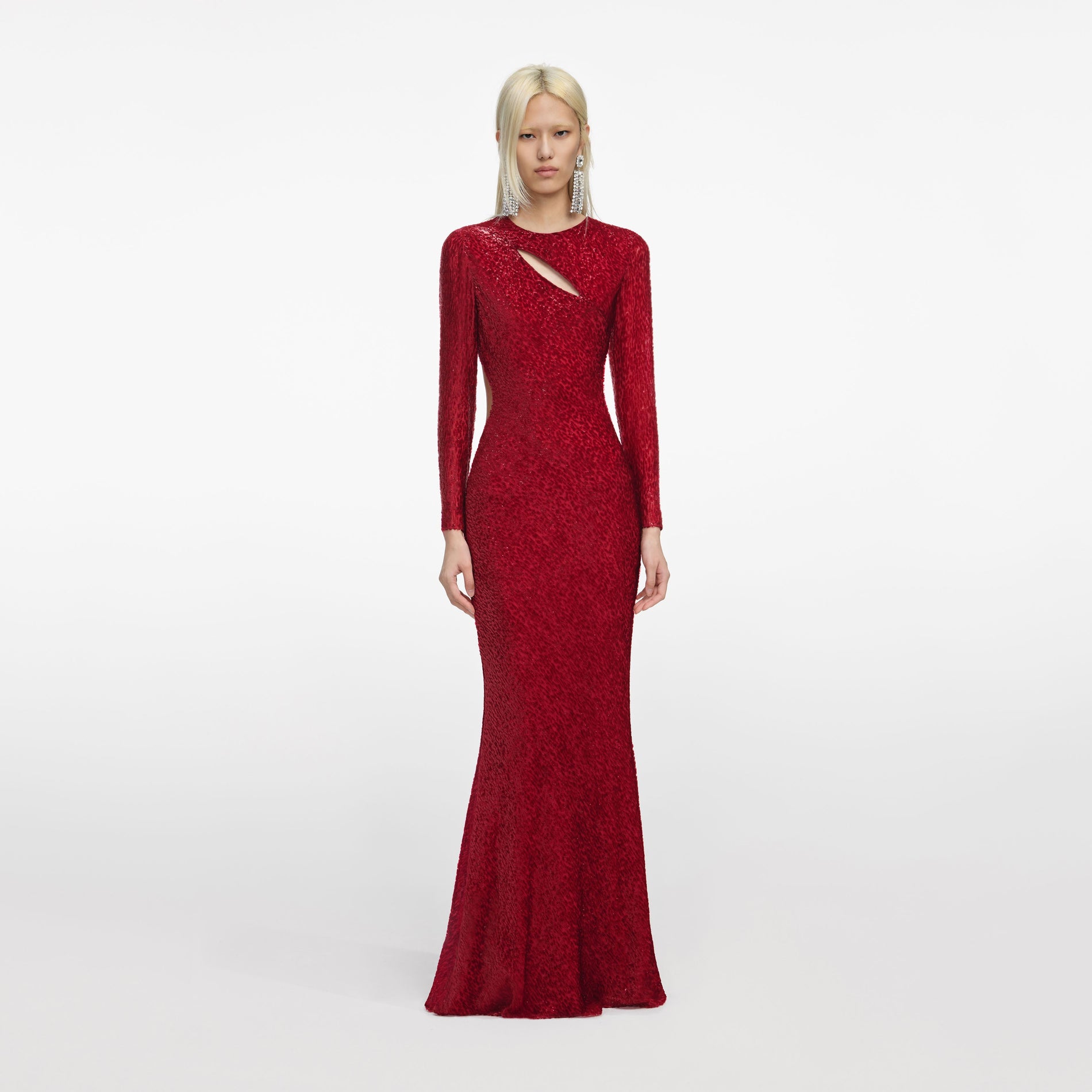 Front view of a woman wearing the Red Fil Coupe Maxi Dress