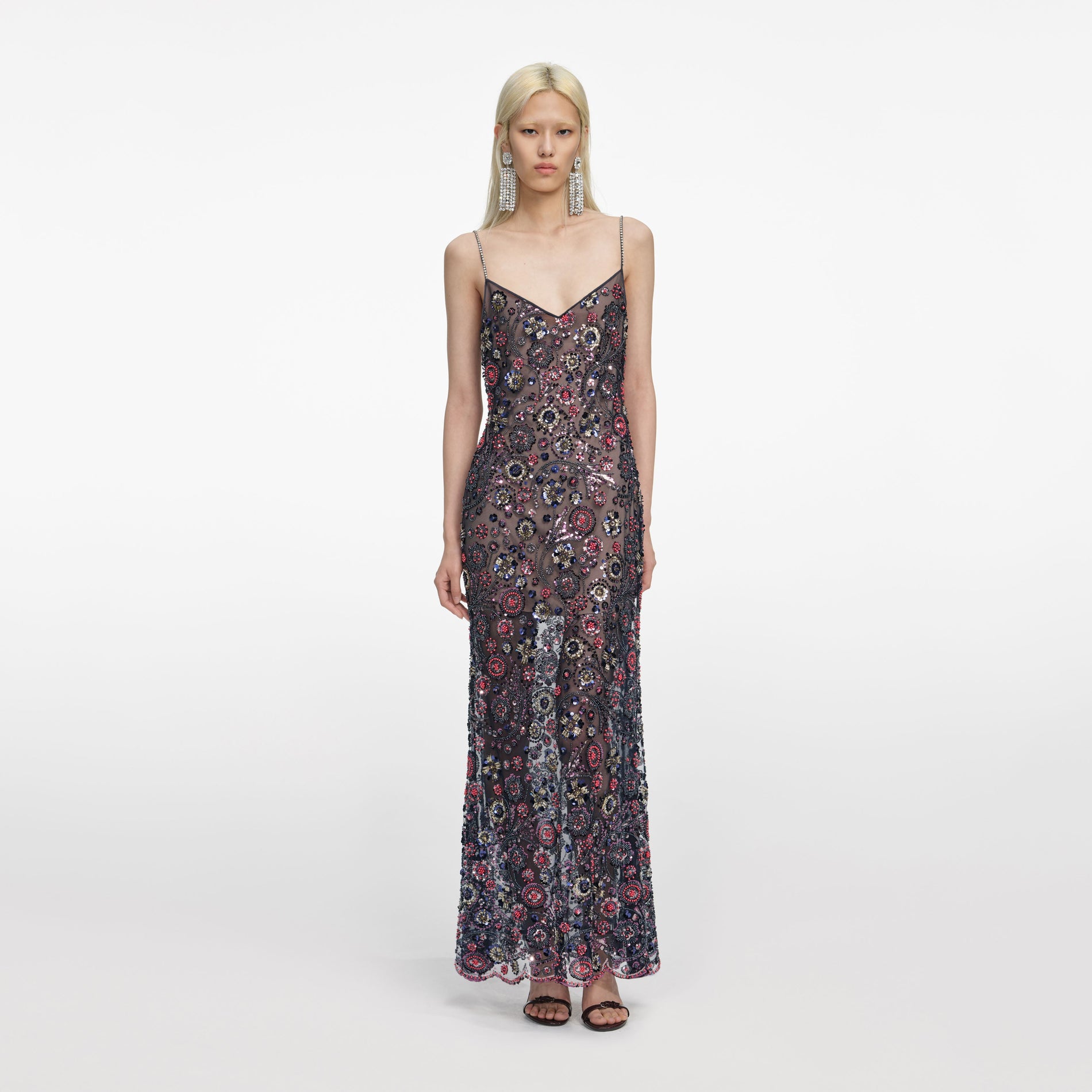 Front view of a woman wearing the Navy Floral Sequin Maxi Dress