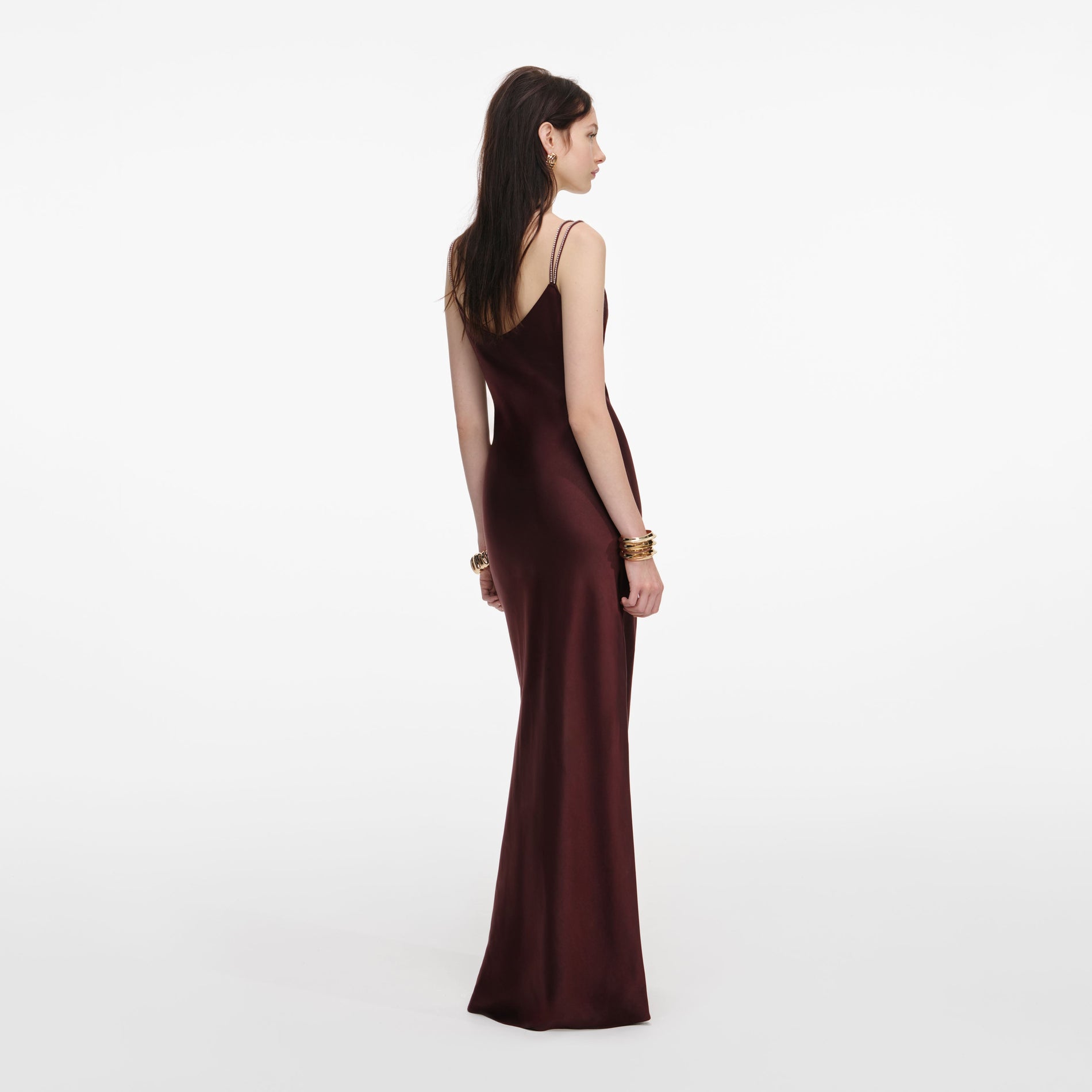 Back view of a woman wearing the Brown Satin Diamante Maxi Dress
