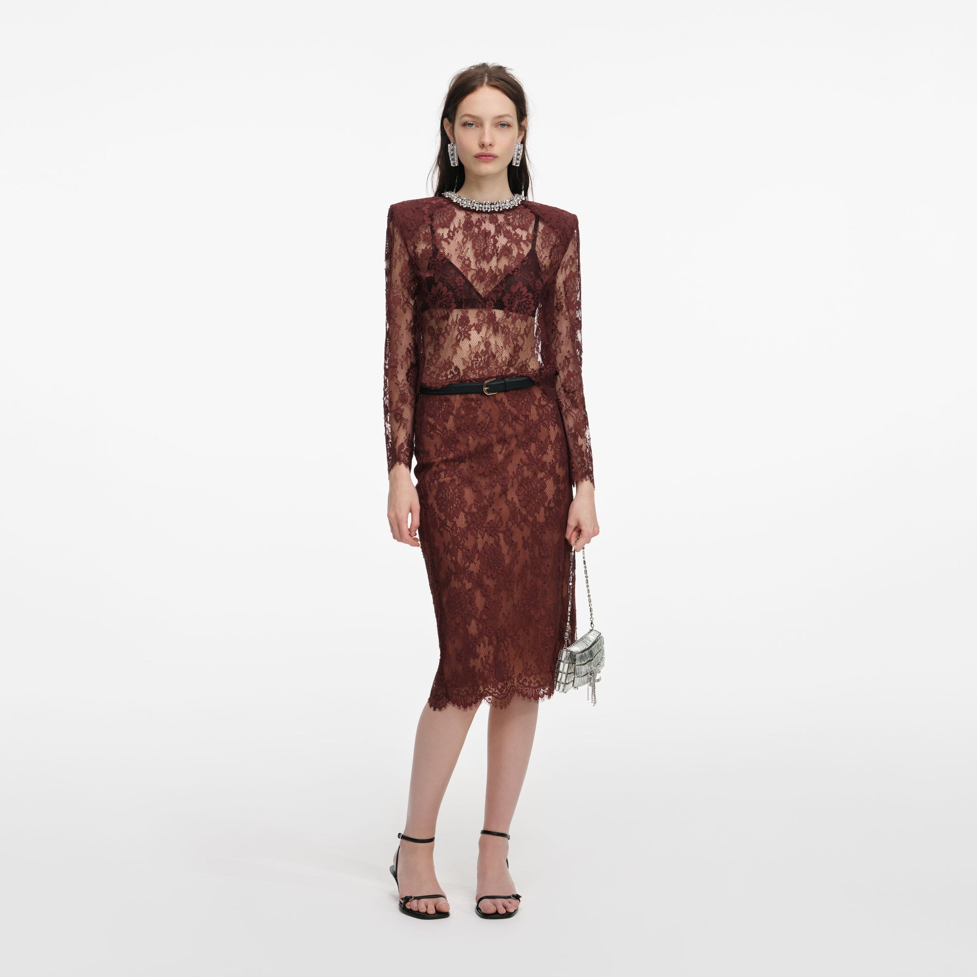 Front view of a woman wearing the Brown Floral Lace Top
