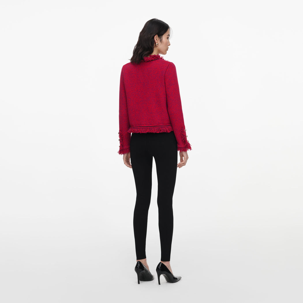Back view of a woman wearing the Red Frayed Knit Jacket