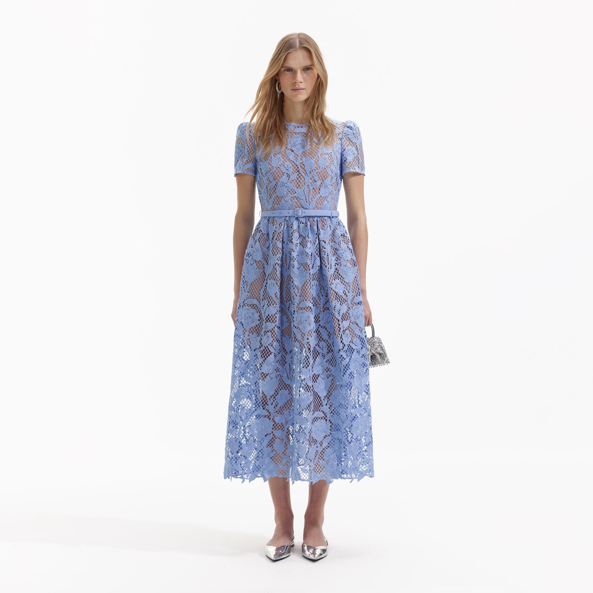 Front view of a woman wearing the Blue Lily Lace Midi Dress