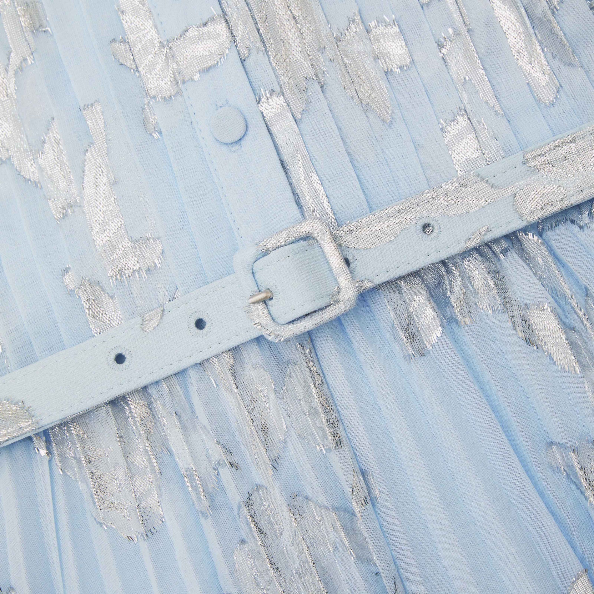A close up of a woman wearing the Blue Metallic Chiffon Maxi Dress