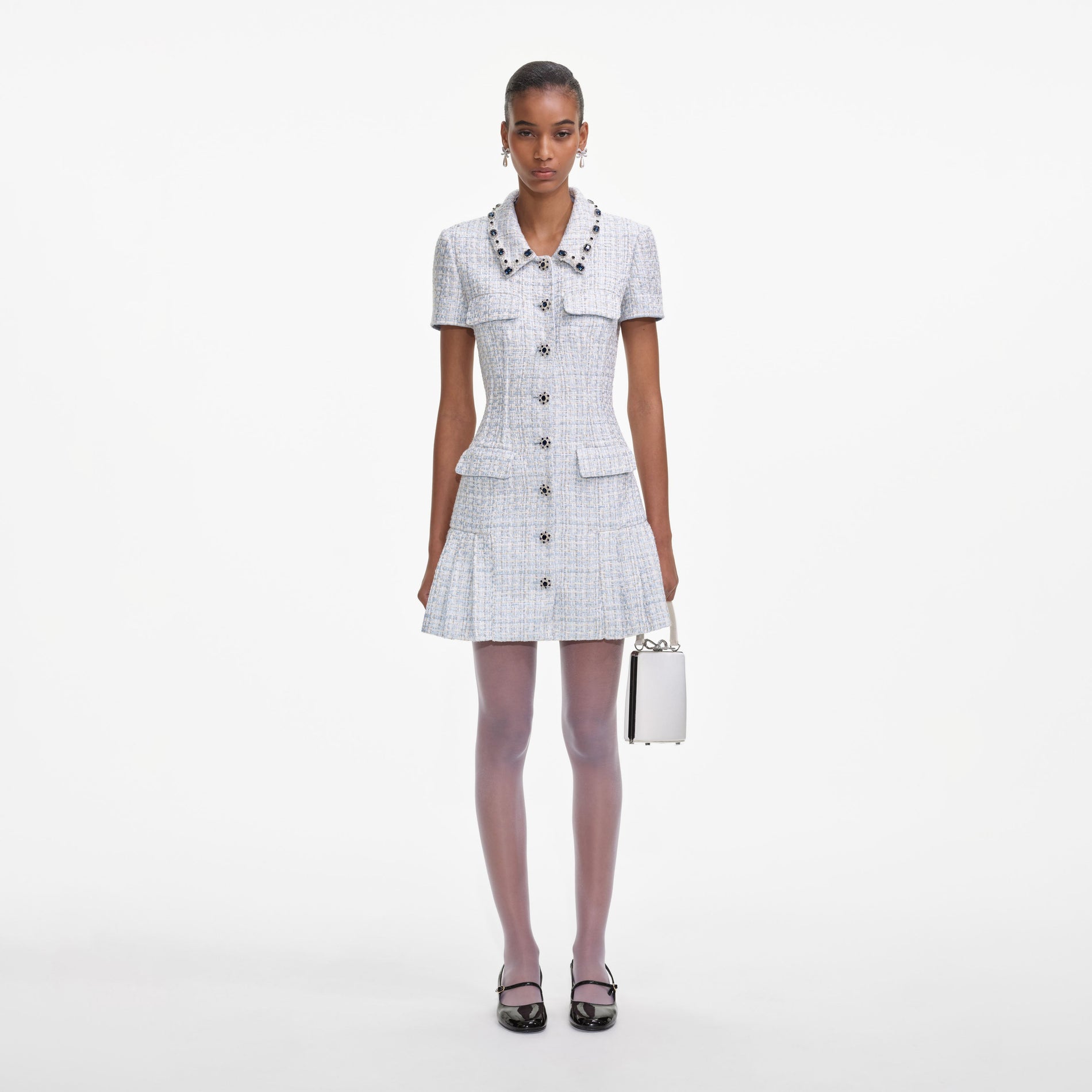 Front view of a woman wearing the Blue Boucle Mini Dress