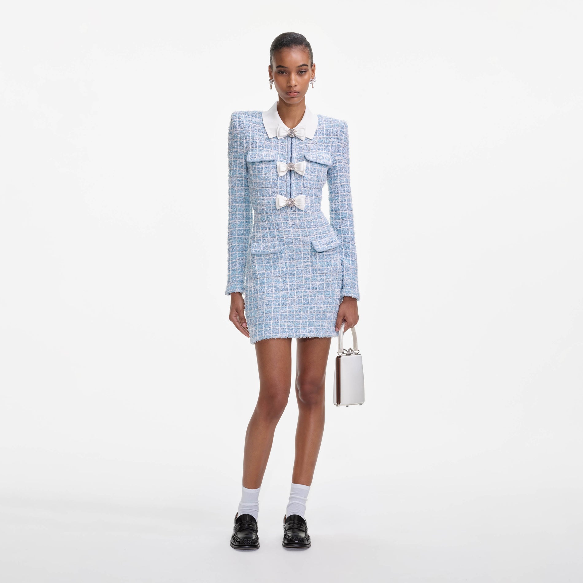Front view of a woman wearing the Blue Check Collared Knit Mini Dress