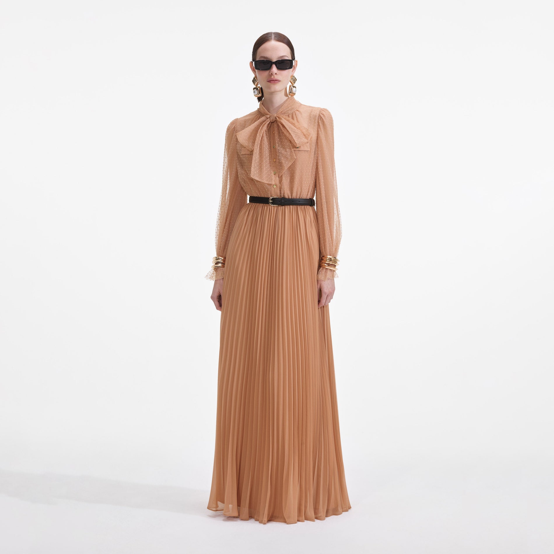 Front view of a woman wearing the Tan Dot Mesh Maxi Dress