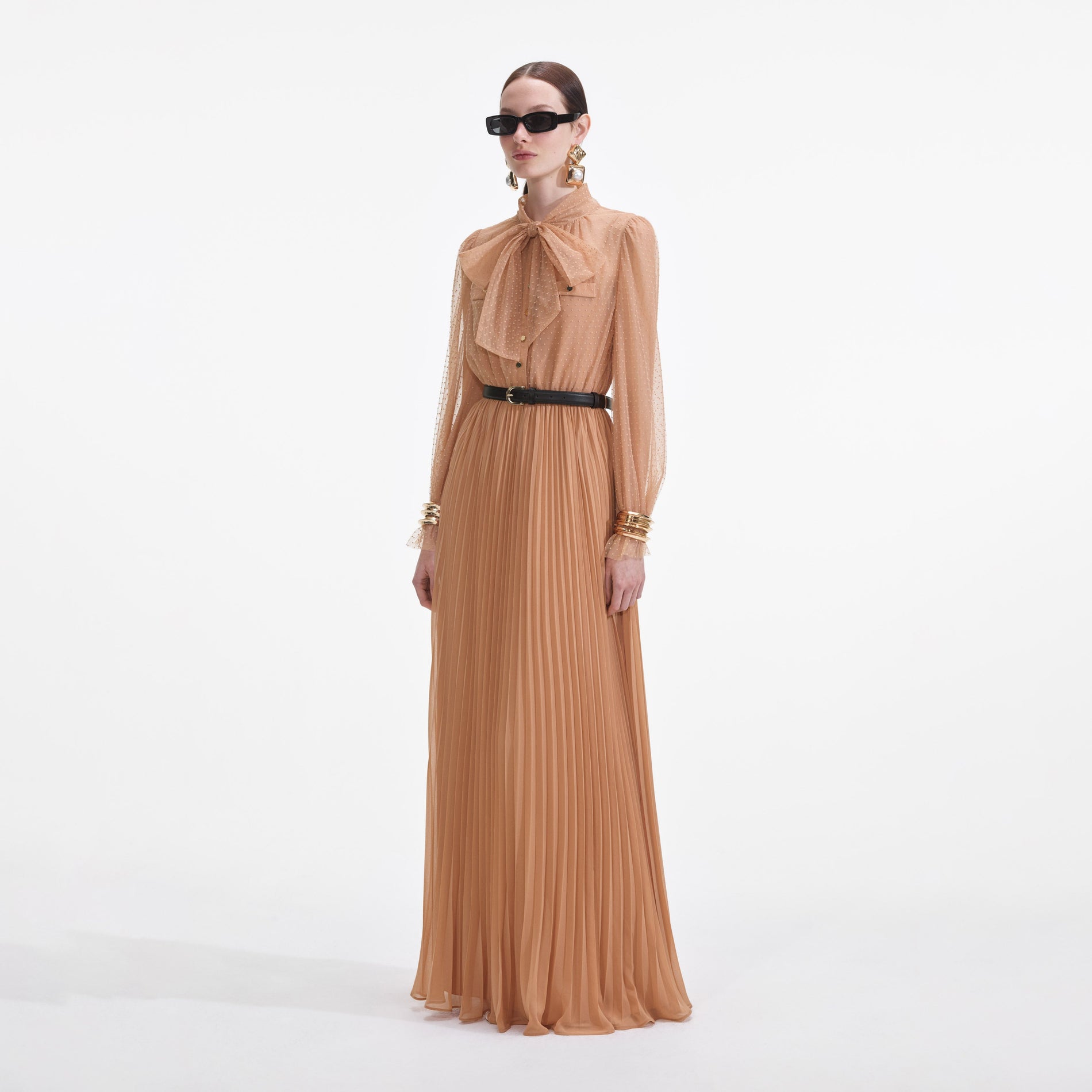 Side view of a woman wearing the Tan Dot Mesh Maxi Dress