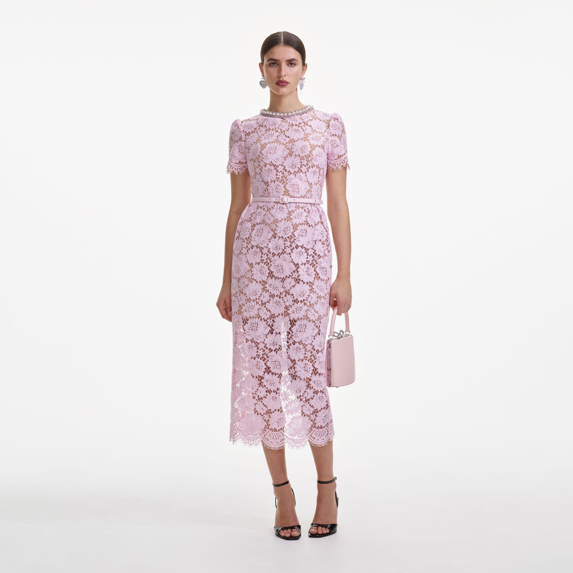 Front view of a woman wearing the Pink Fine Lace Pearl Midi Dress
