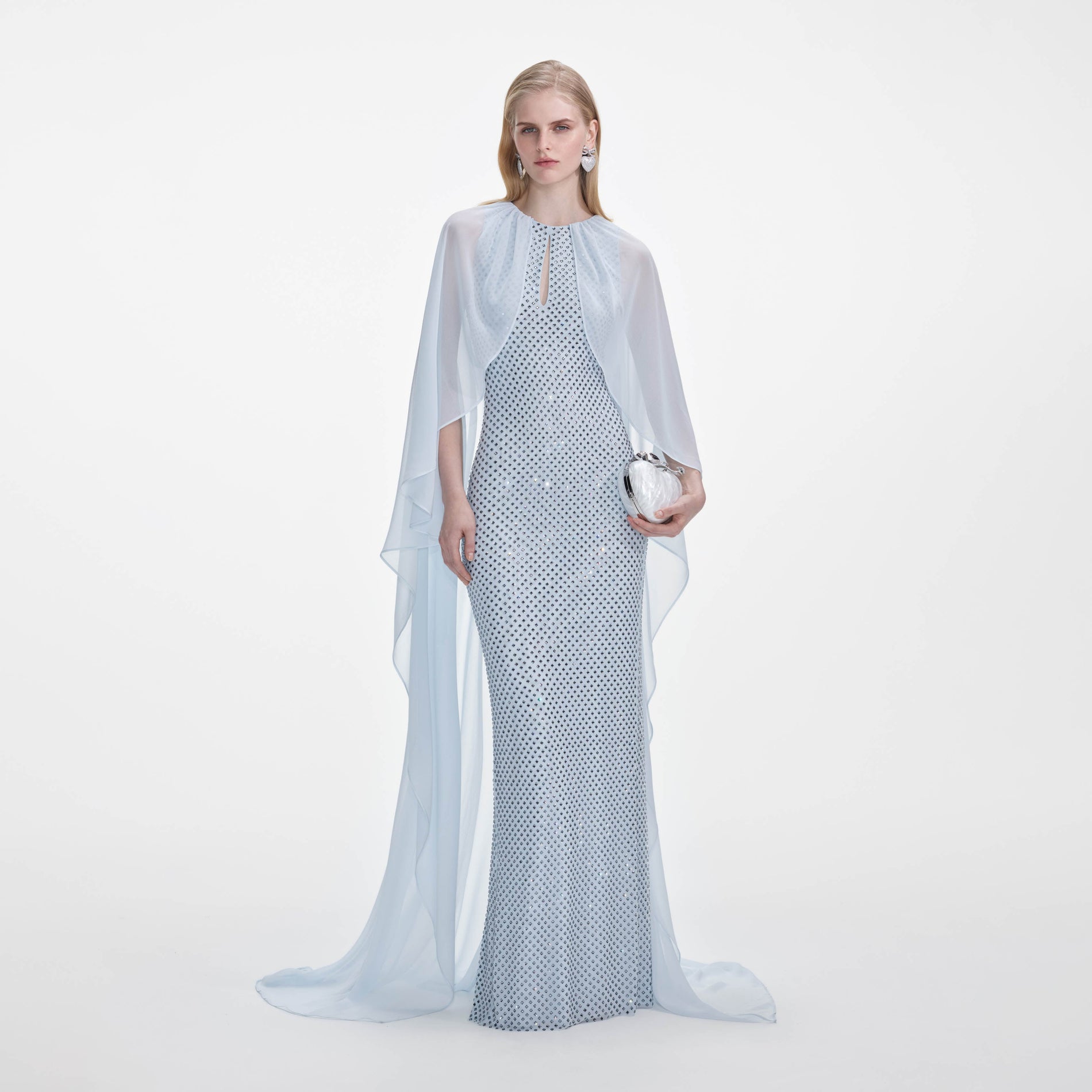 Front view of a woman wearing the Pale Blue Rhinestone Cape Maxi Dress