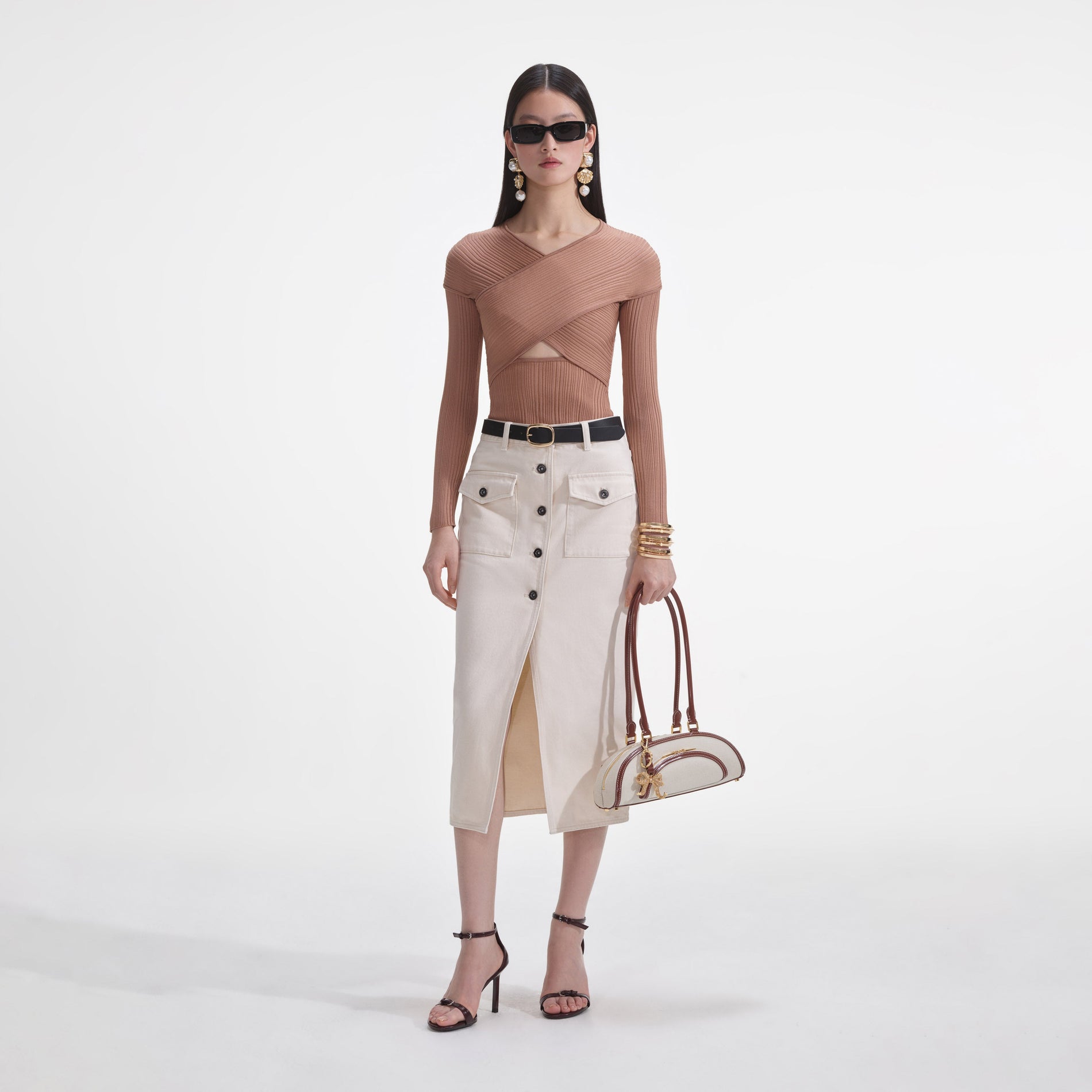 Front view of a woman wearing the Beige Ribbed Knit Wrap Top