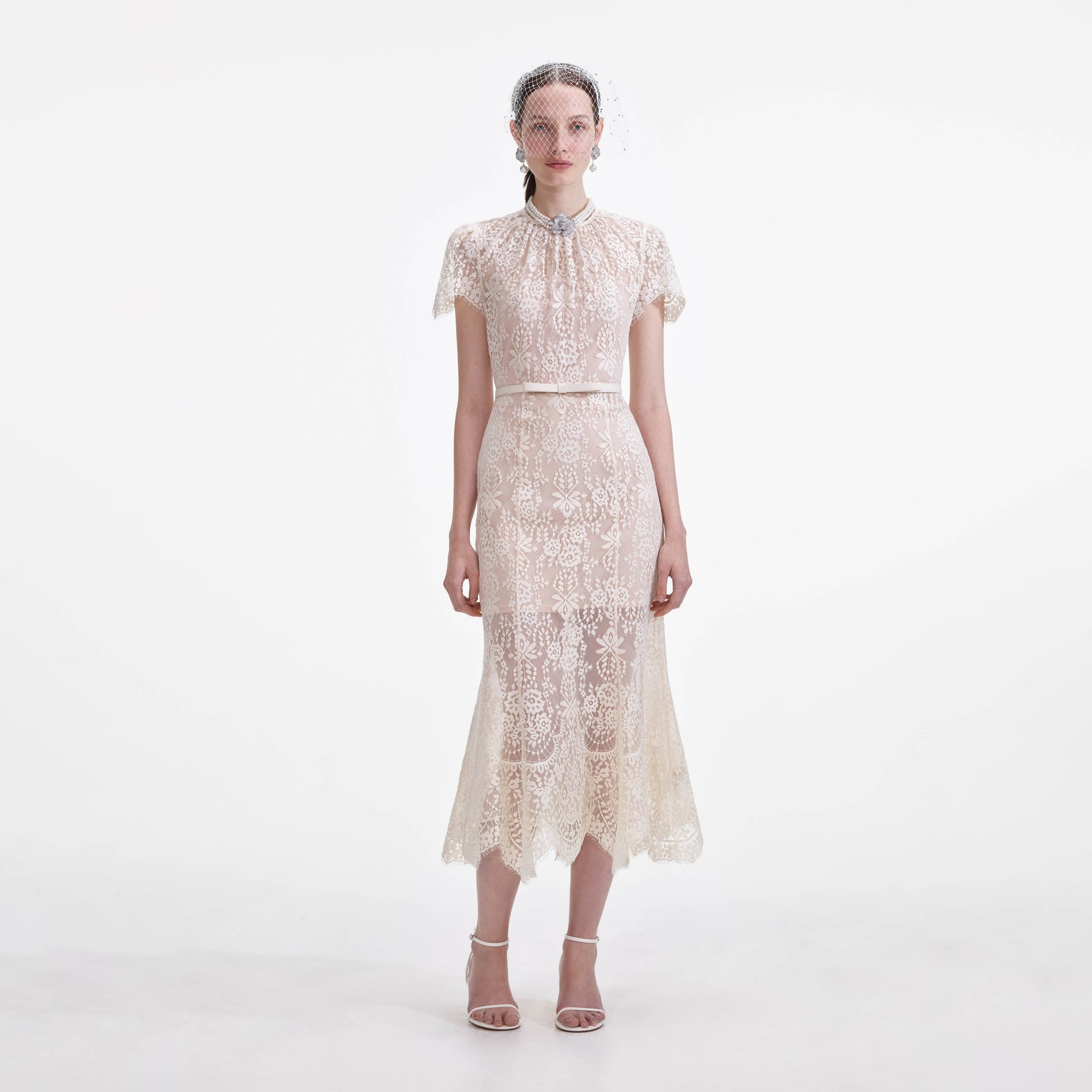 Front view of a woman wearing the White Lace Midi Dress