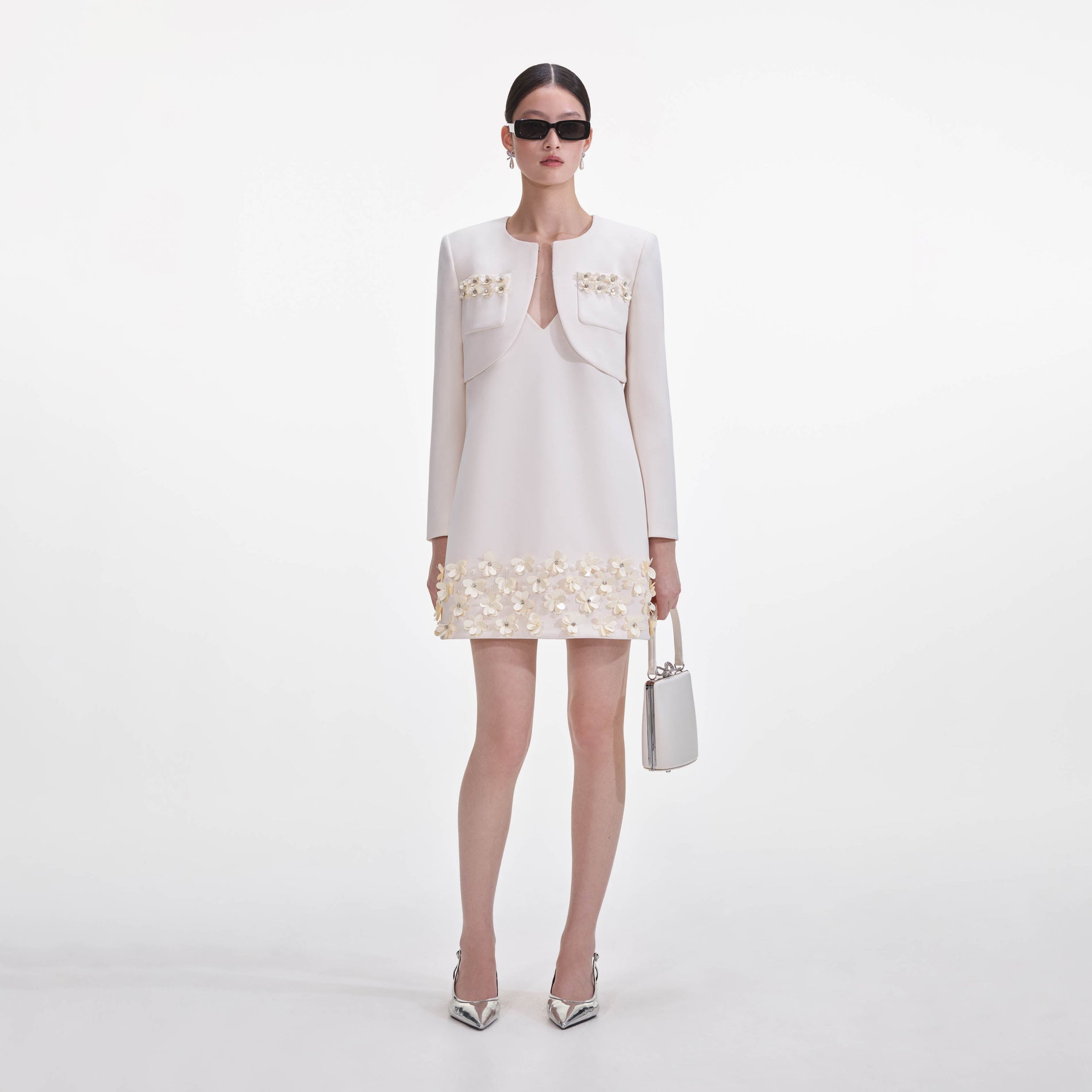 Front view of a woman wearing the Cream Crepe 3D Sequin Jacket