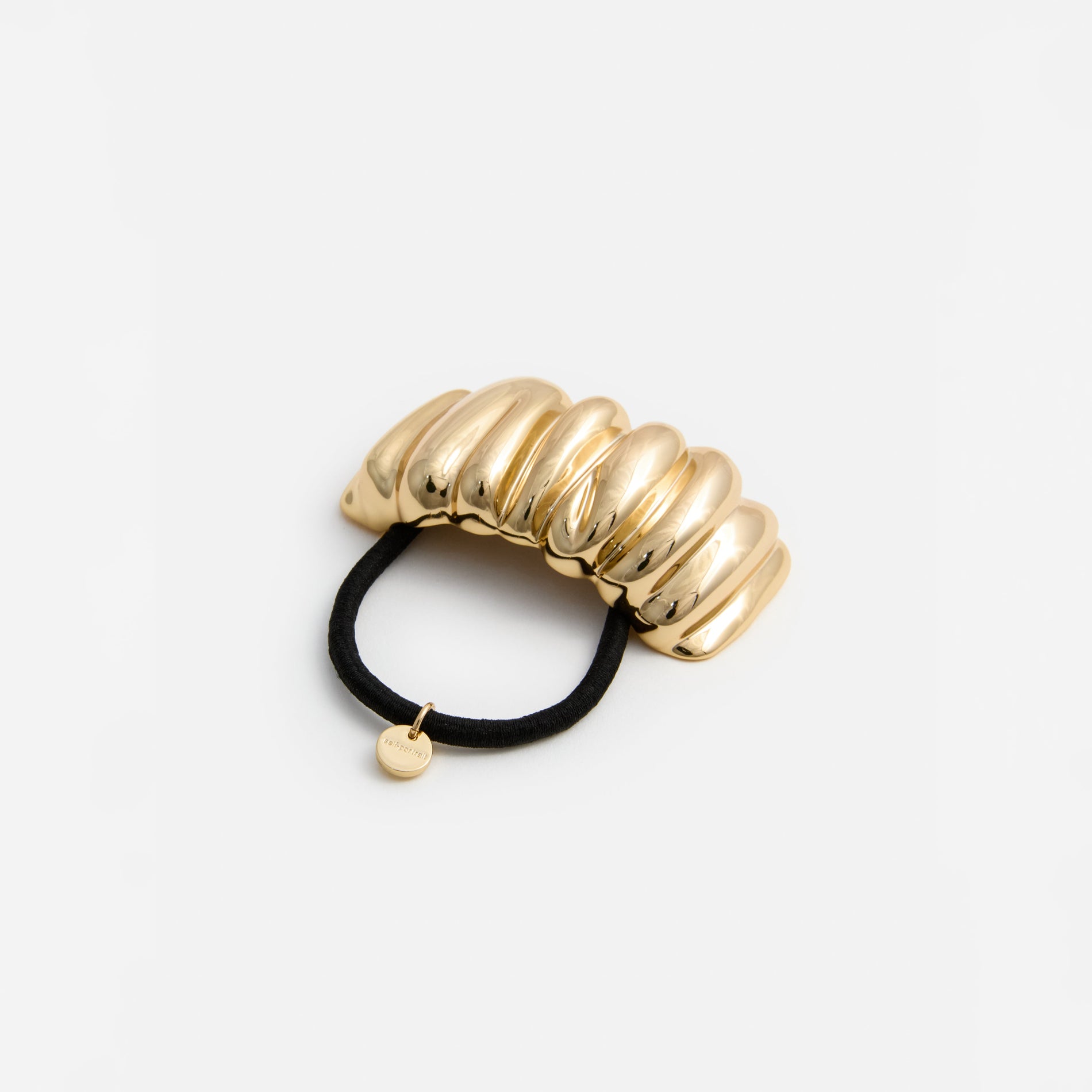 A photo of the Mottled Gold Hair Cuff