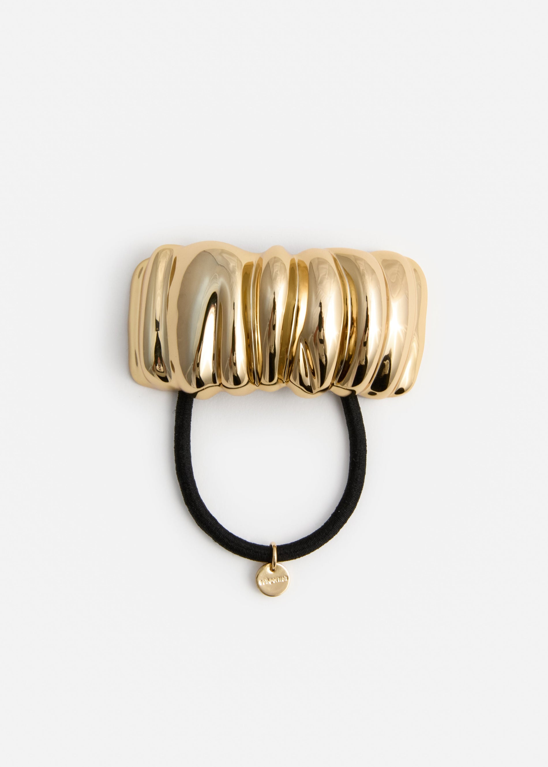 A photo of the Mottled Gold Hair Cuff