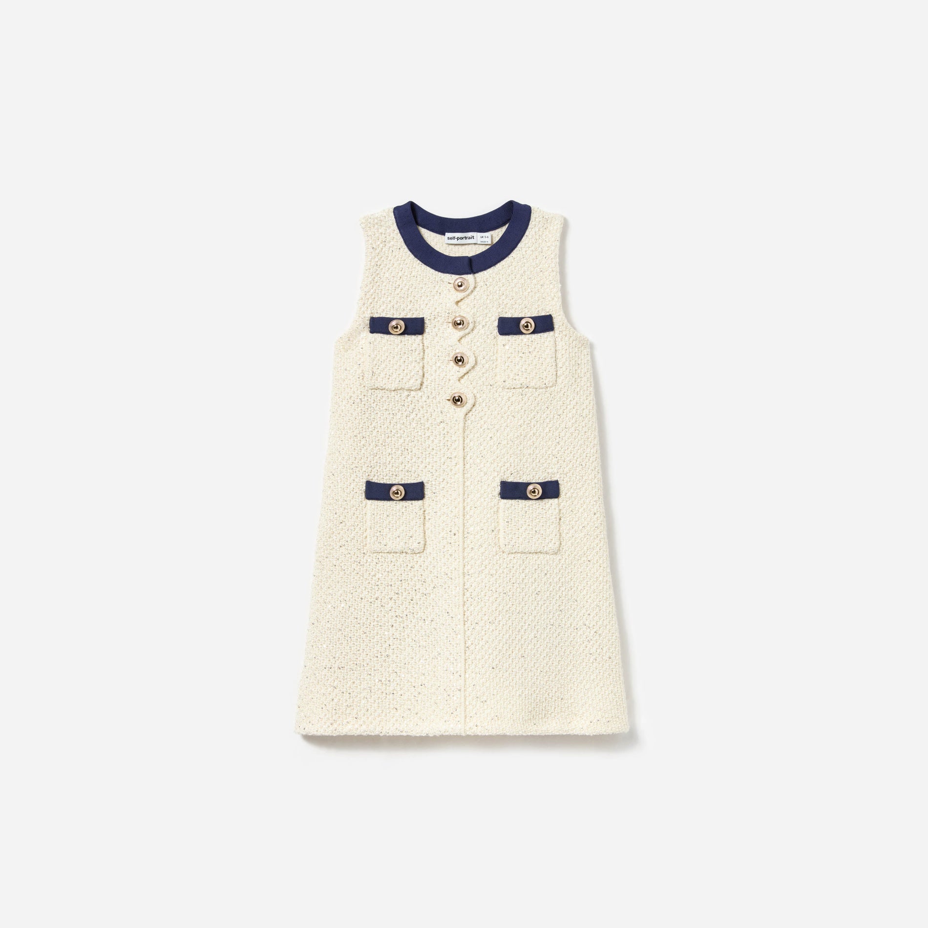 Front view of a woman wearing the Cream Sequin Knit Dress