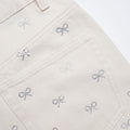 Cream Denim Diamante Bow Jeans