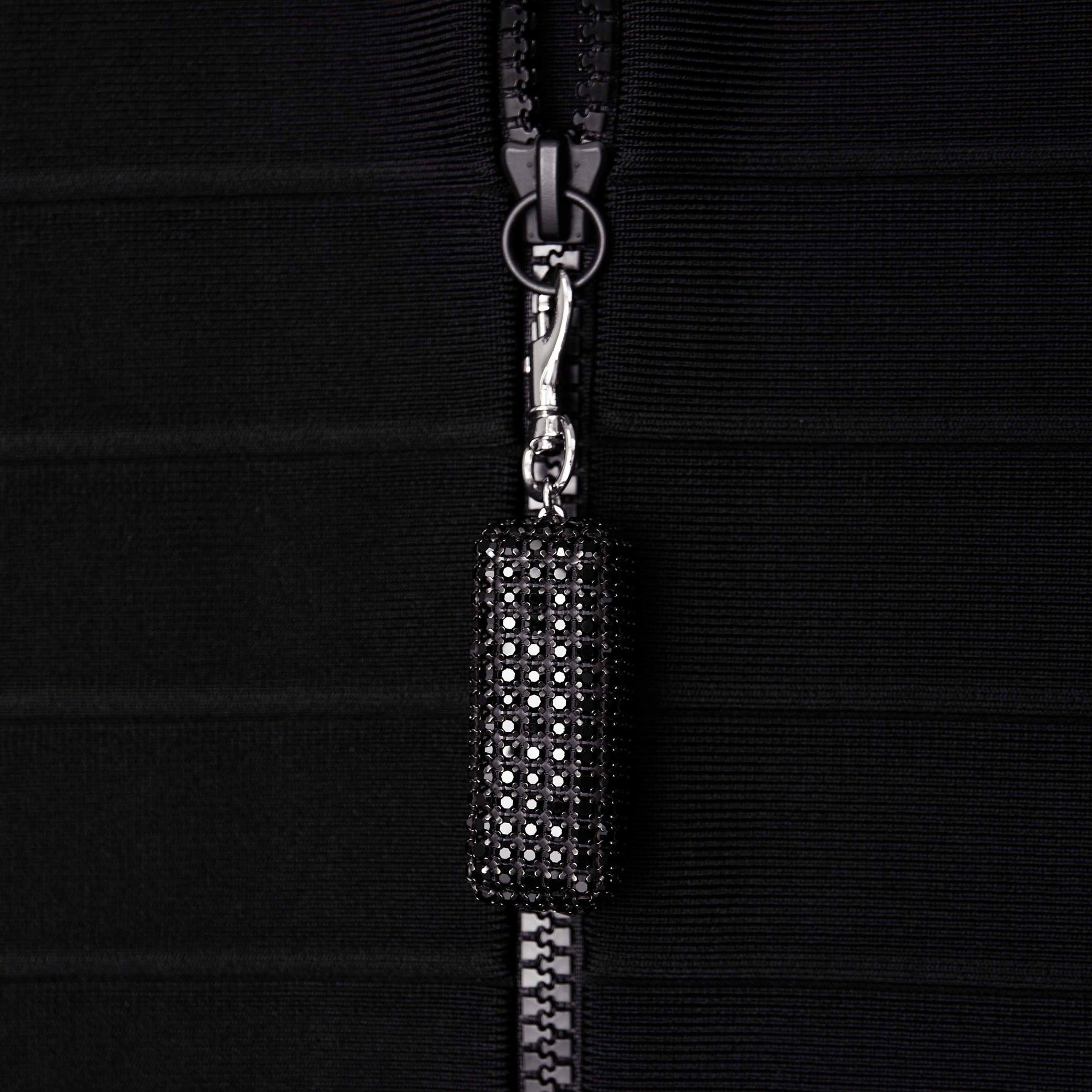 A close up of the fabric for the Black Ruffle Knit Midi Skirt