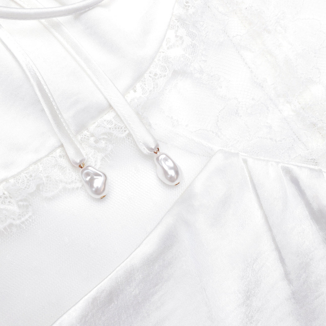 A close up of the fabric for the White Satin Lace Top