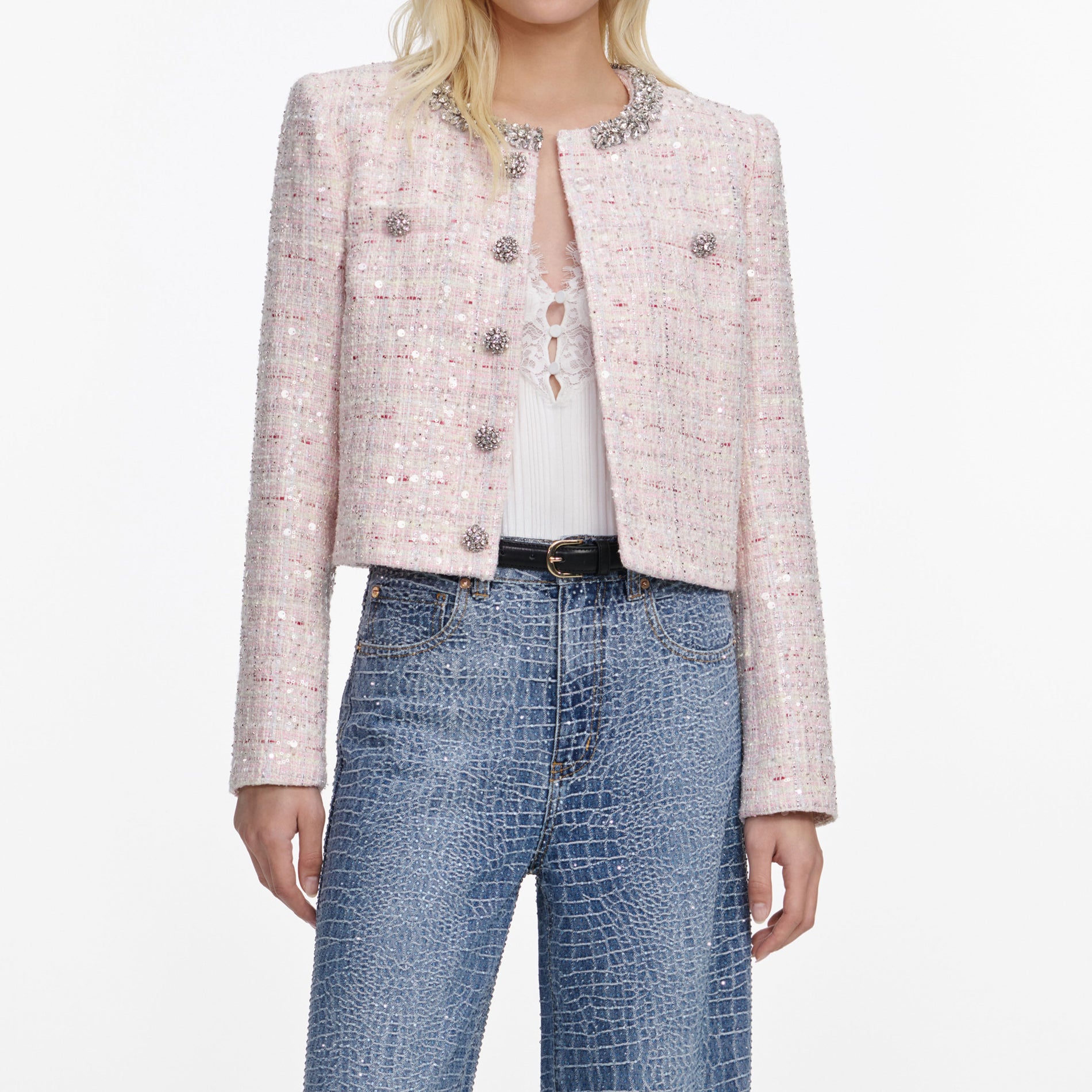 A close up of a woman wearing the Pink Sequin Boucle Jacket