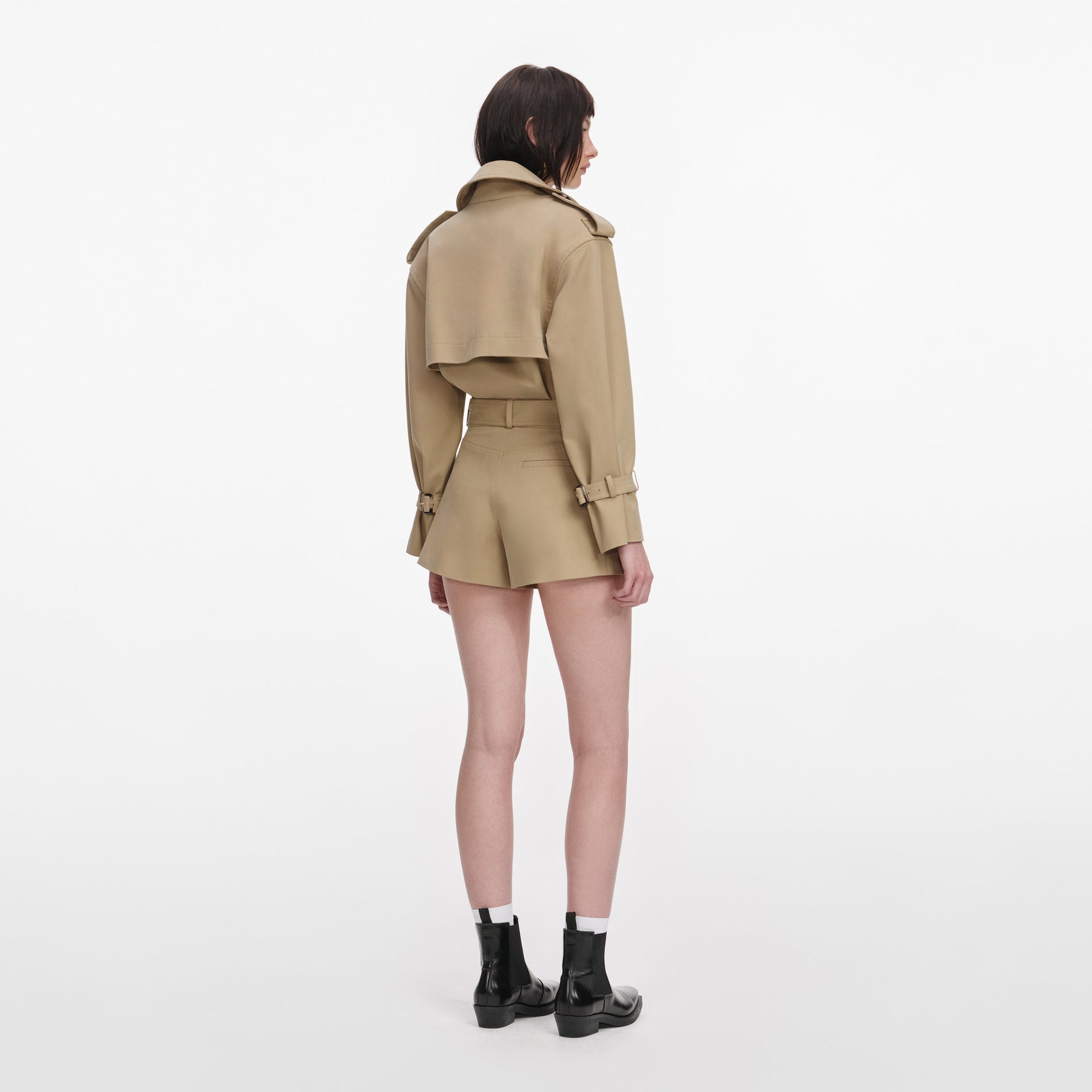 Back view of a woman wearing the Beige Cotton Playsuit