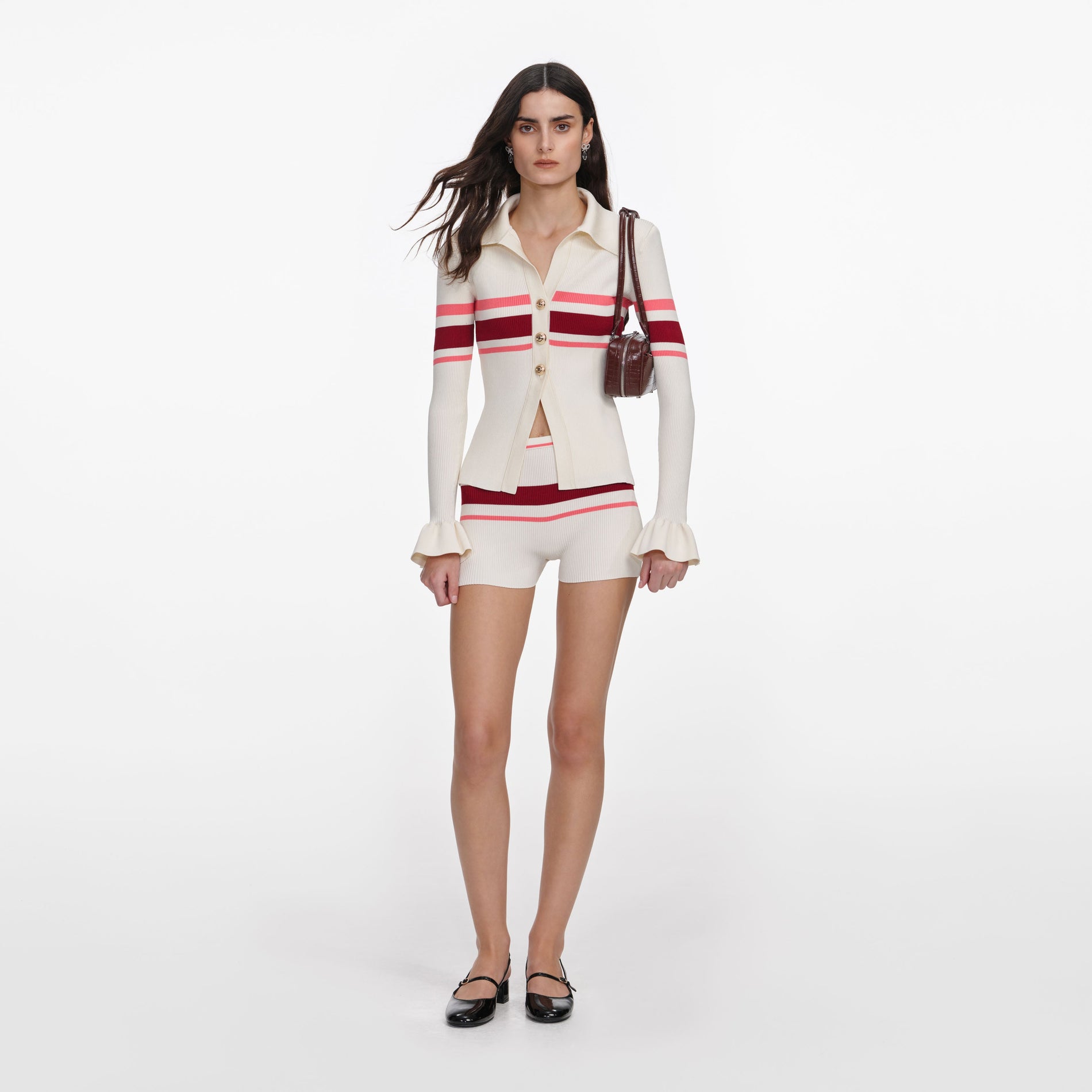 Front view of a woman wearing the Cream Stripe Viscose Knit Button Top