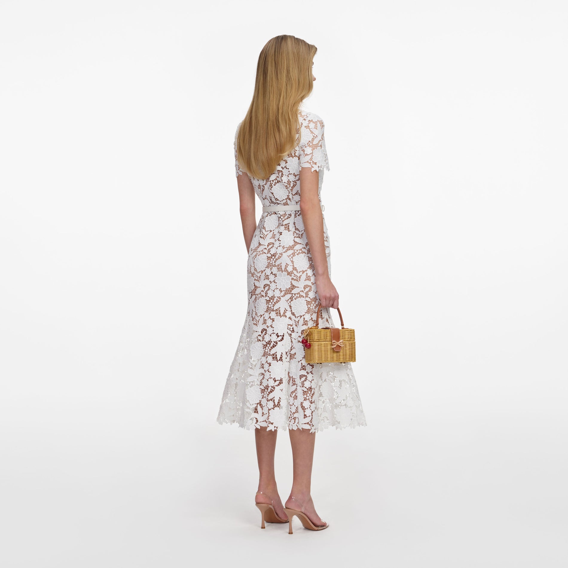 Back view of a woman wearing the White Lace Collared Midi Dress