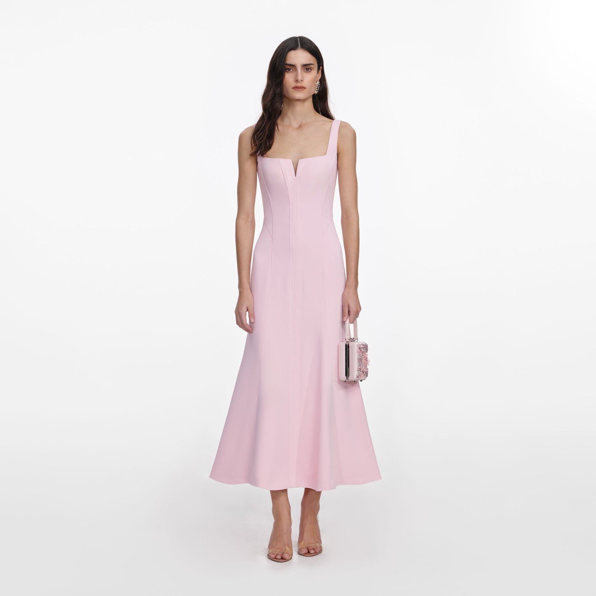 Front view of a woman wearing the Pink Crepe Midi Dress